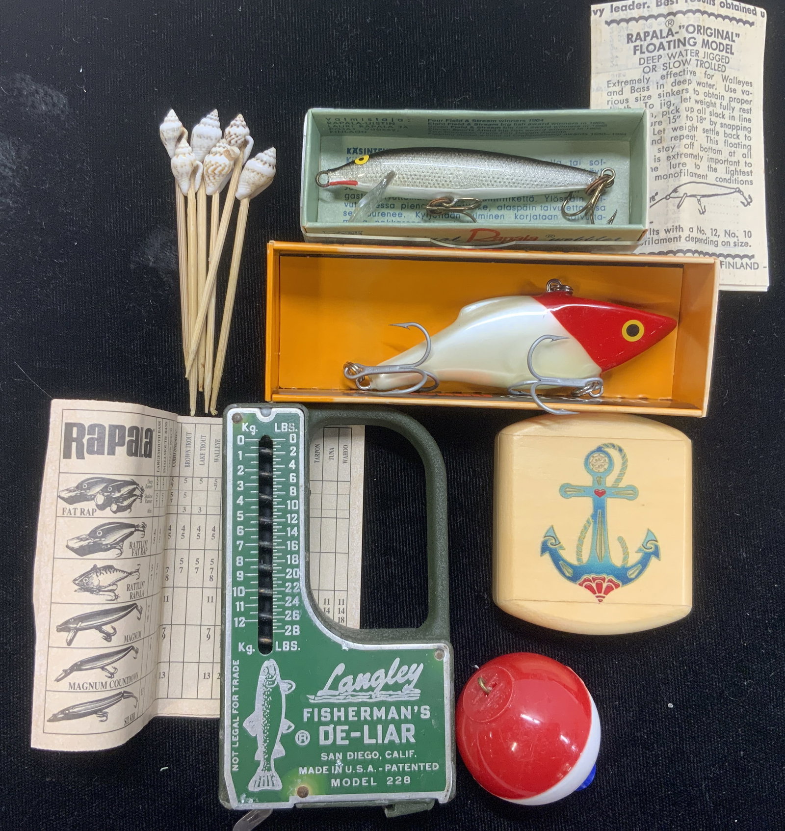 11 Fishing Access. Fish Hooks, Langley Fish Scale: Vintage Langley fishermans De-Liar Scale , model 220 . Weighs in pounds and kilograms. 4.5 x 2 in. Hand crafted wooden trinket box with boat anchor. Buoy floating fish hook ( needs hook). . Vintage Ra