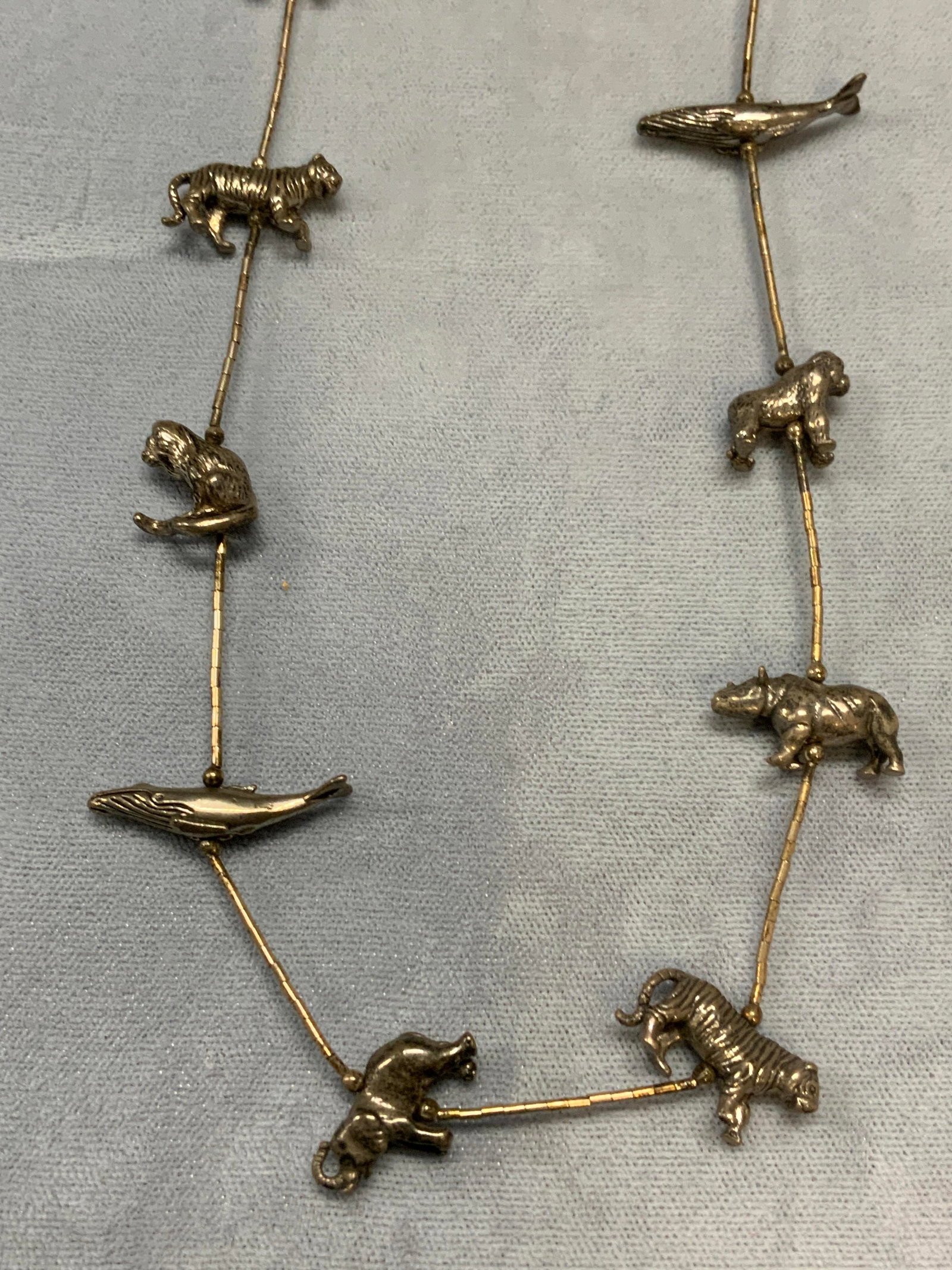 Vintage Sterling Silver Animal Pendant Necklace: Vintage sterling silver necklace with beaded animal pendant. Tests for sterling using PuriTEST kit. Drop length approx. 14.25 inches. Total weight 1.62 ozt. Some surface wear including scratching obse