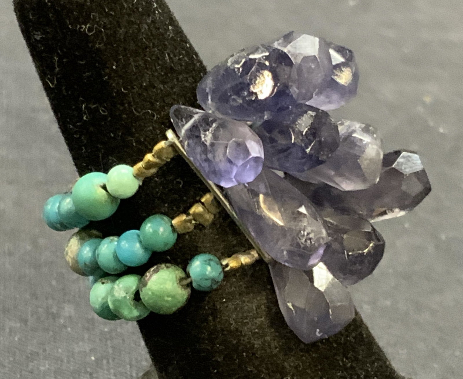 Vintage Purple Gemstone Ring: Vintage purple gemstone ring with turquoise style beaded band. Ring size 6. Some surface wear including scratching observed. Estate jewelry, costume jewelry, cocktail jewelry, fashion jewelry, accesso