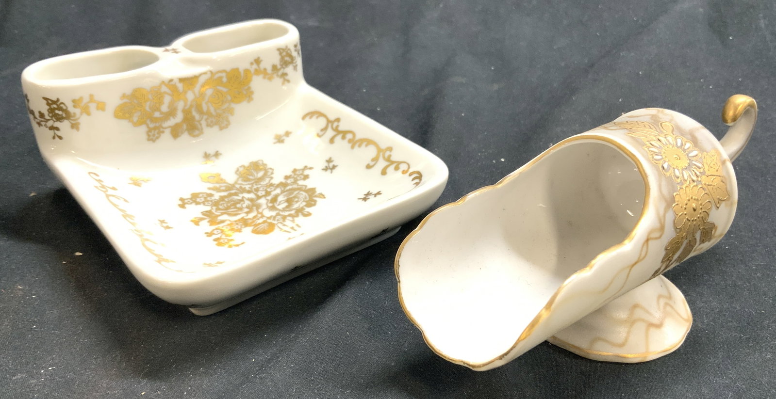 LIMOGES France Porc Trinket Dish & Tea Scoop: Underside of trinket dish is marked. HAND PAINTED LIMOGES FRANCE. Piece is white with gilt floral, scroll, & leaf detail. Lot includes 1 LIMOGES dish & 1 tea scoop ( white with gilt rim & floral detai