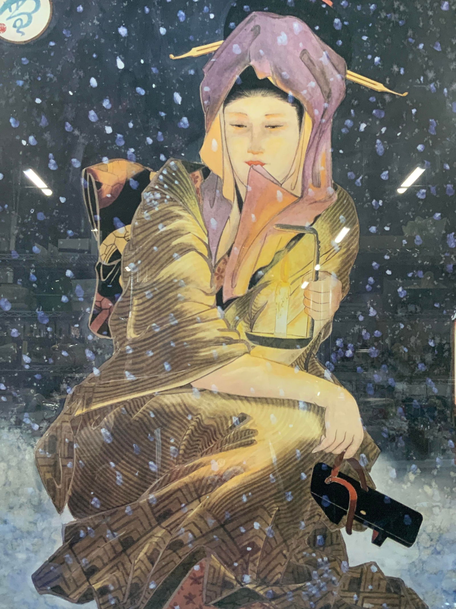 Muramasa Kudo Snow Woodblock Lithograph: Marked on right corner Muramasa Depicts a Japanese woman in a kimono kneeling in the snow with a Geta sandal in one hand and a lantern in the other Framed in a black plastic coated wooden frame with b