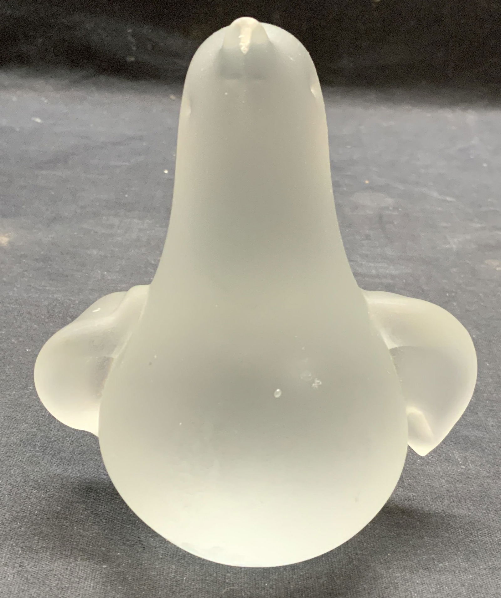 Satin Frosted Glass Penguin Figural Paperweight: Satin/frosted glass Penguin figural paperweight. Measures approx. 4.25 x 4.75 inches. Some surface wear including scratching observed. Penguin, Penguin figural, Penguin paperweight, glass penguin, dec
