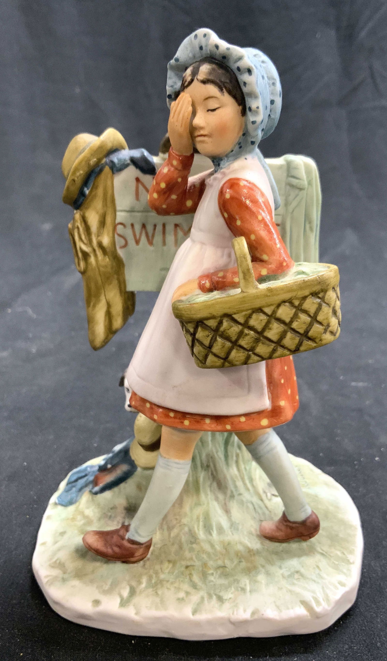 NORMAN ROCKWELL NO SWIMMING Vtg Porc Figural: Underside is marked NORMAN ROCKWELL NO SWIMMING JUNE 15TH 1929 FROM THE WORLD OF GORHAM. Figure is vintage and porcelain. Piece depicts a female figure walking with basket next to sign which reads NO