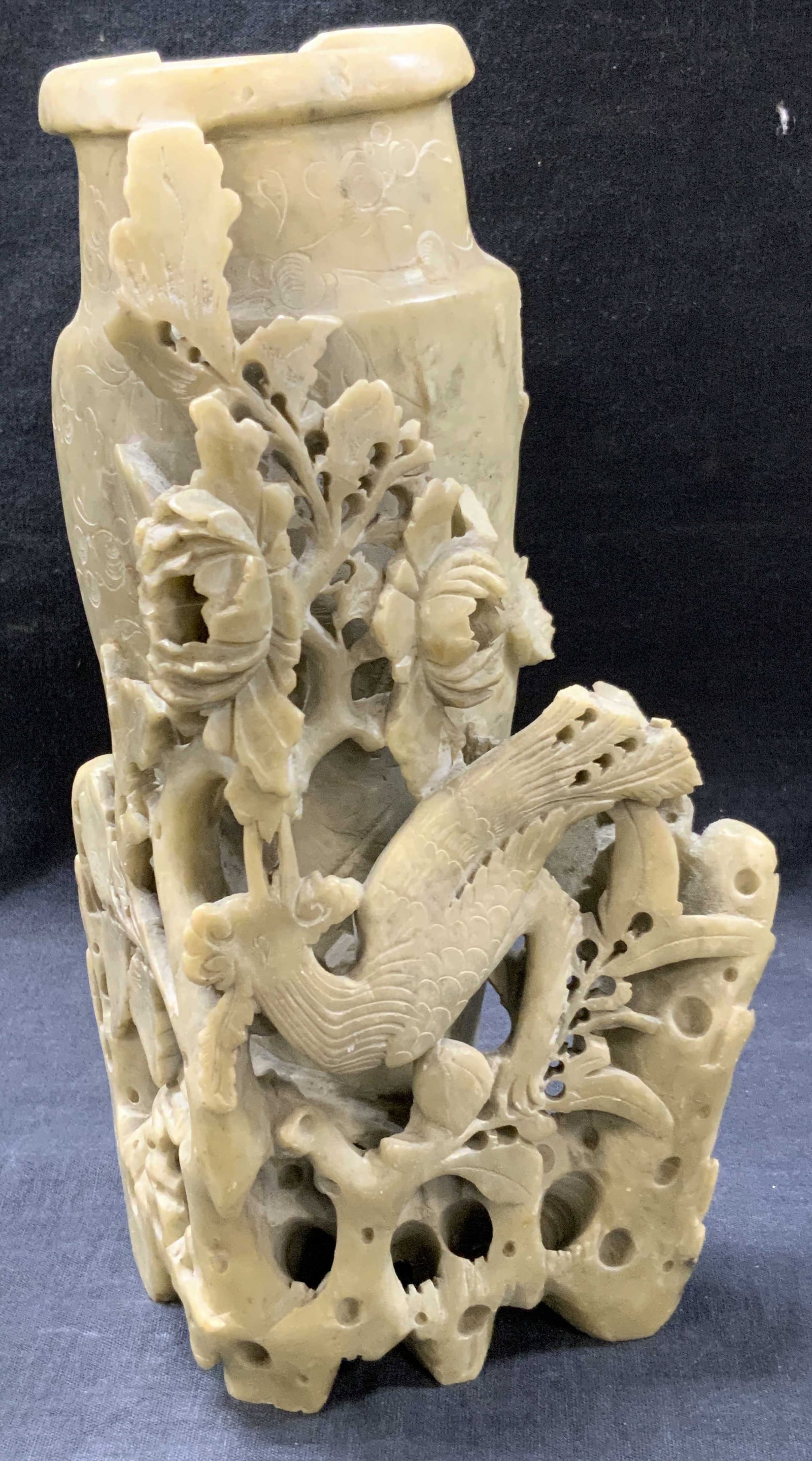 Asian Carved Jadeite Floral & Bird Figural Vase: Asian style carved Jadeite floral and vase figure with etched bird motifs and peony motifs. Approx 9 inches tall and 5 inches wide. Evident losses to rim of figure. Home decor, carved jadeite decor, h