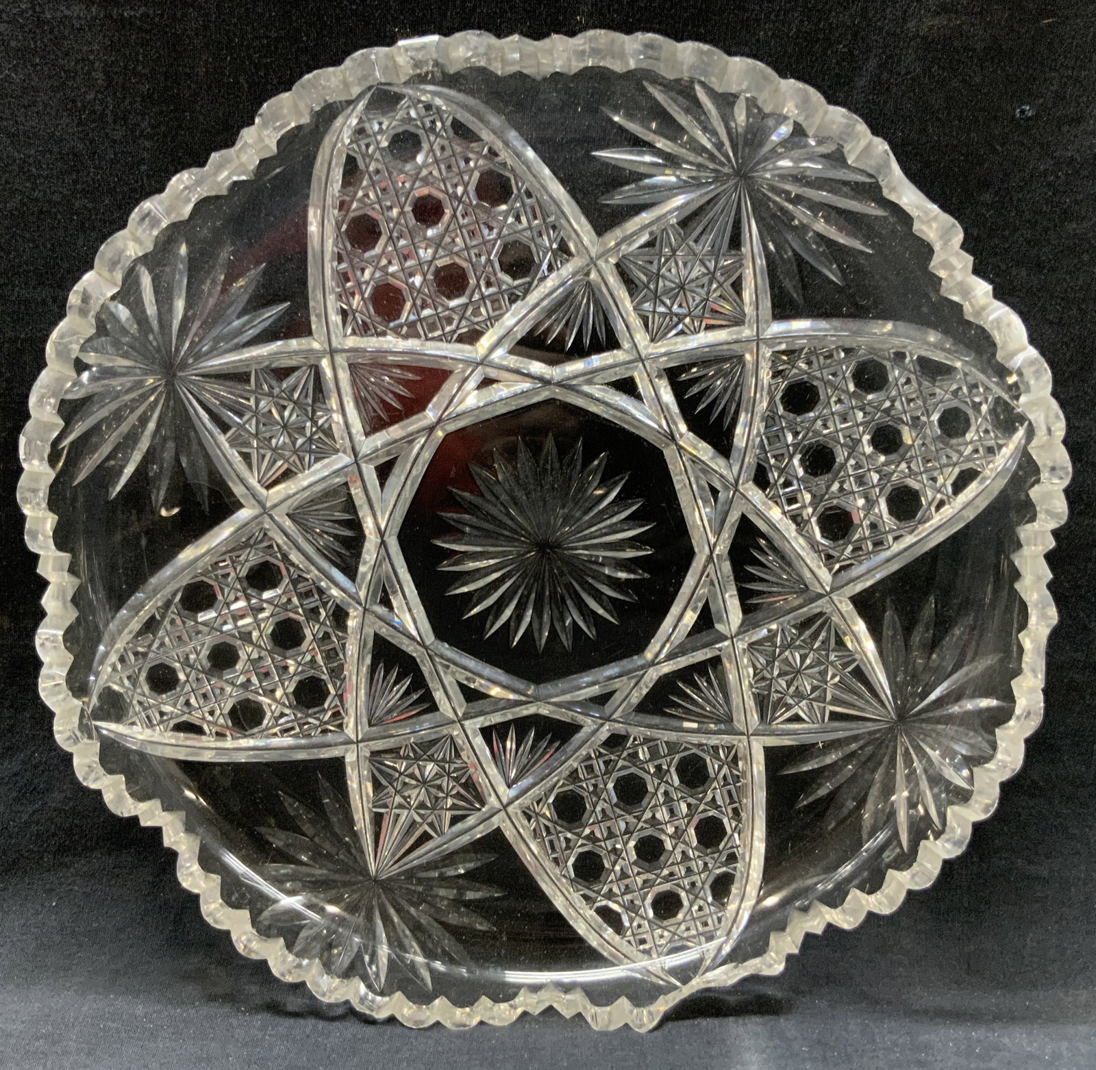 Cut Crystal Centerpiece Platter: Cut crystal centerpiece platter with scalloped edges and Star burst cut undersides. Evident losses to outer edges of platter. Cut crystal decor, cut crystal platter, centerpiece platters, home decor, 
