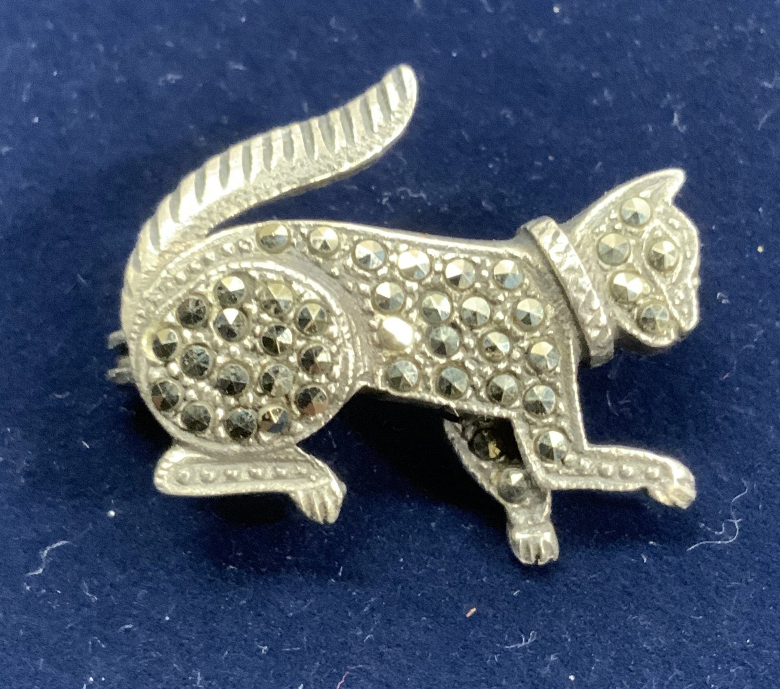 Sterling Silver Marcasite Kitten Brooch: Sterling silver brooch of a kitten, marked 925. Measure 1 x 3/4 in. Glittery marcasite enhances this piece. .14 ozt Luxury Estate Jewelry, luxury vintage jewelry, Ladies Luxury Fashion, Luxury Cocktai