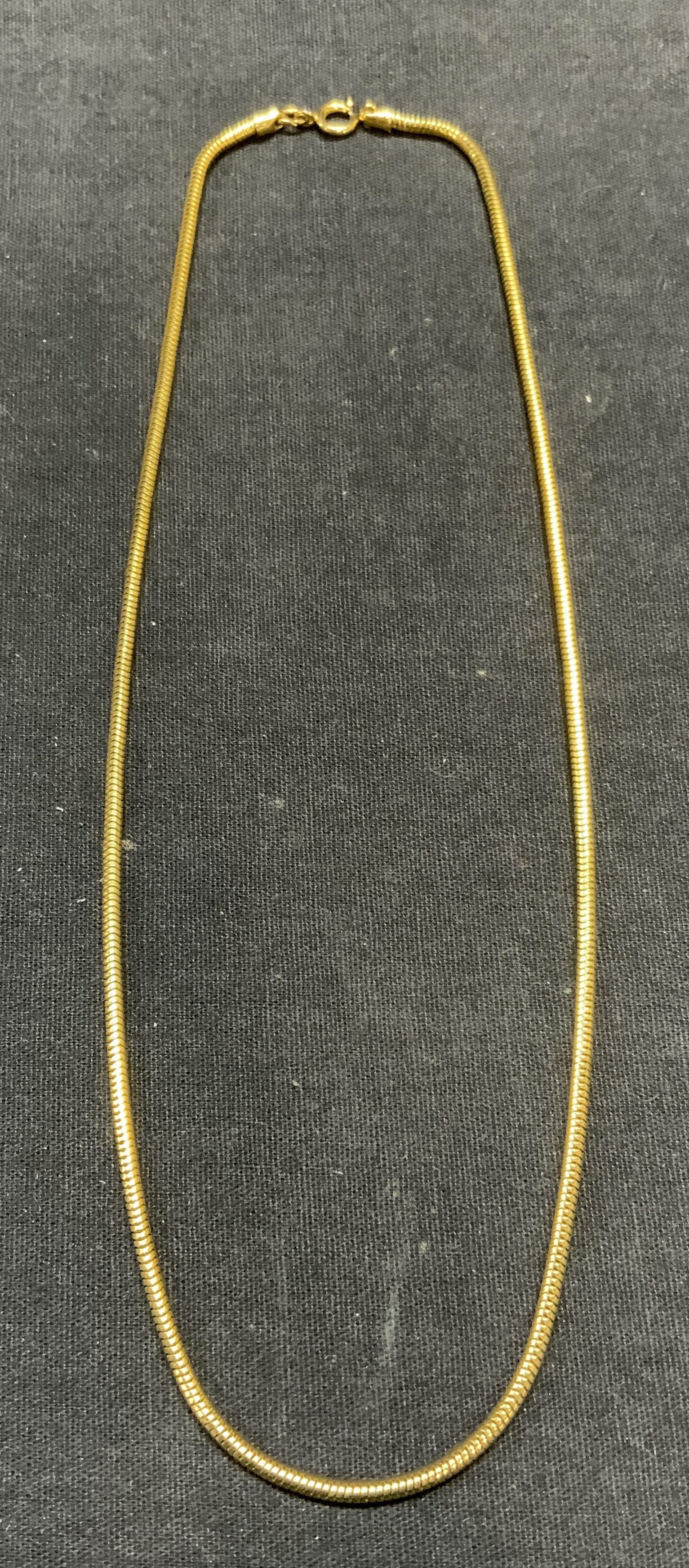 Gold Tone Snake Chain Necklace: Gold tone snake chain necklace. Drop length approx. 8.75 inches. Some scratching observed. Estate jewelry, costume jewelry, cocktail jewelry, fashion jewelry, accessories, fashion accessories, wearabl