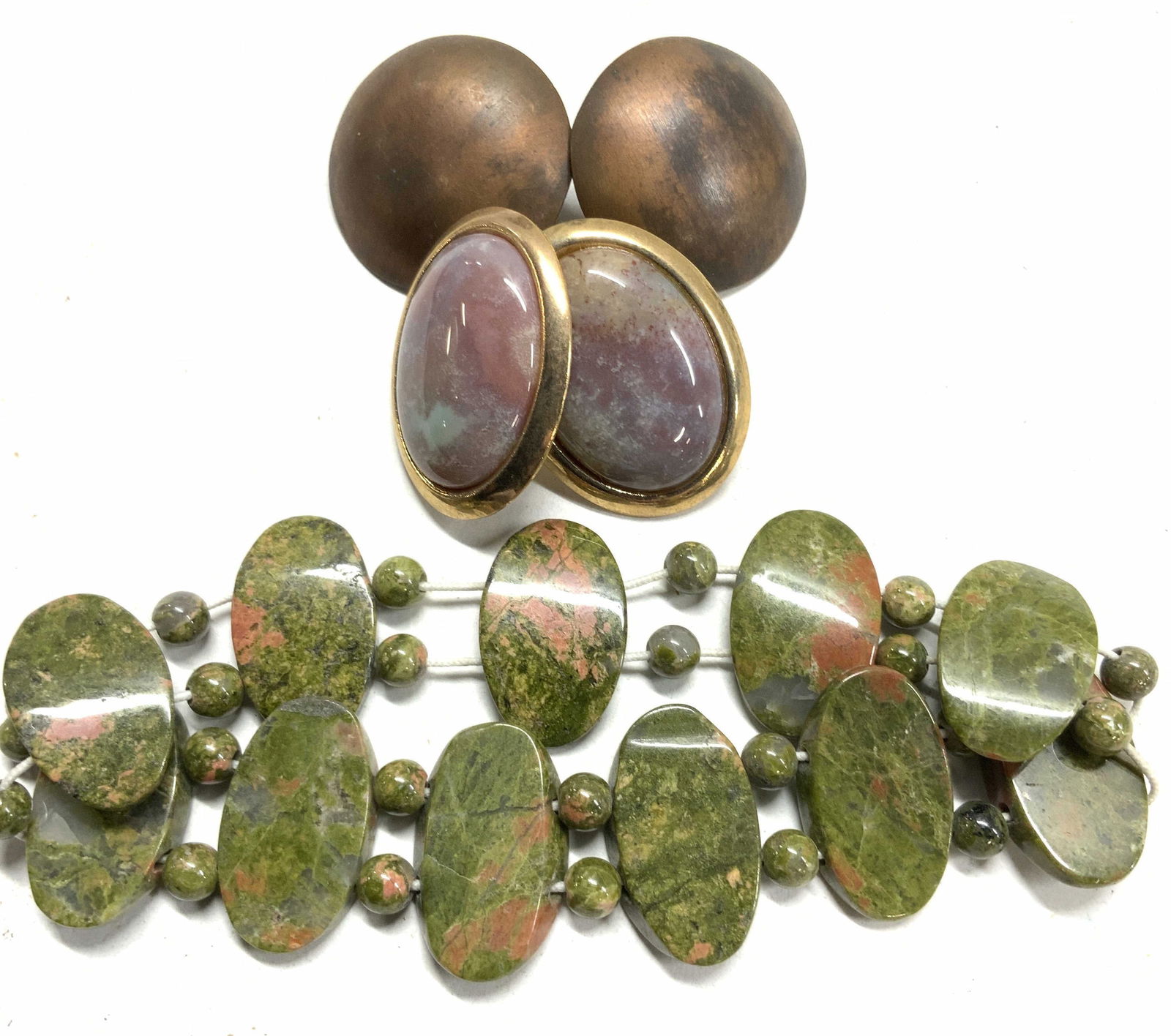 Lot 5 Unakite Bracelet, 2 Prs Lrg Stud Earrings: Unakite bracelet, hand strung, approx 1 in wide, 3 in diameter. Previously a stretch bracelet that has been stretched to max. Wear as is or up cycle. 166 cts unakite gemstone beads. Natural stone Cabo