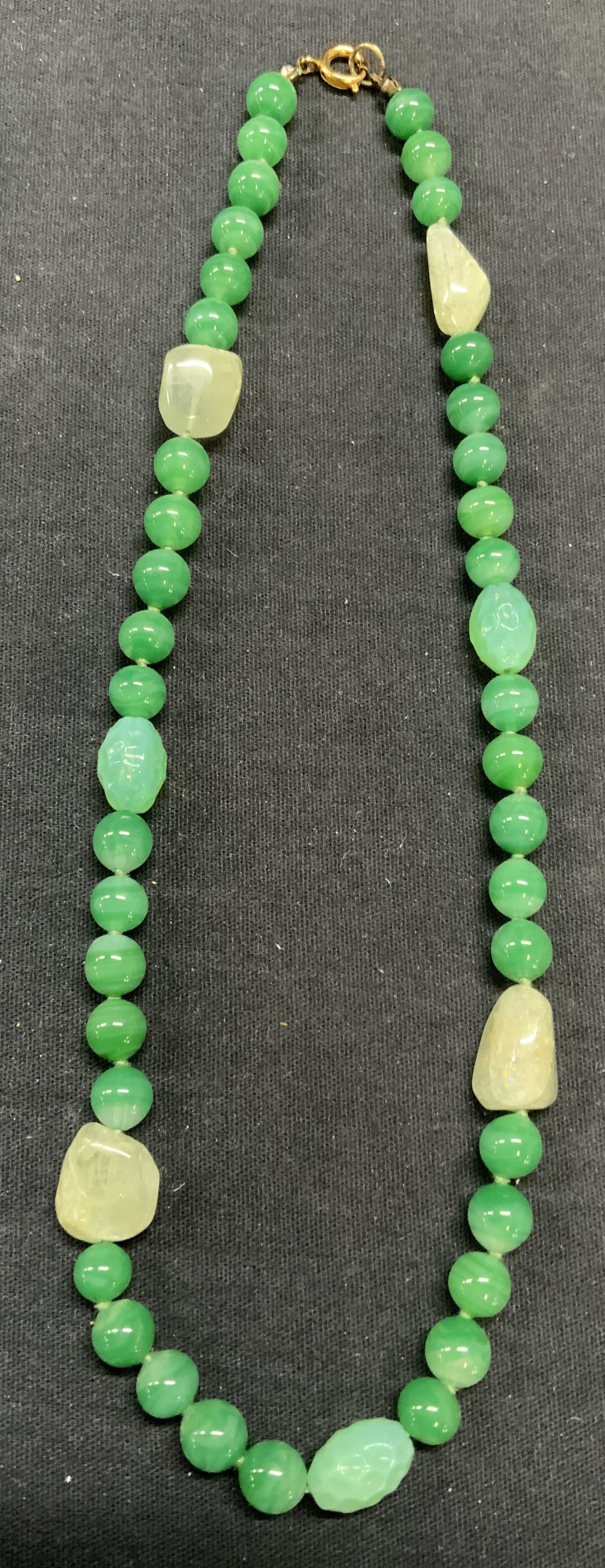 Vintage Jade Glass Beaded Necklace: Vintage jade toned glass beaded necklace with natural stone accents. Drop length approx. 8.5 inches. Some scratching observed. Estate jewelry, costume jewelry, cocktail jewelry, fashion jewelry, acces