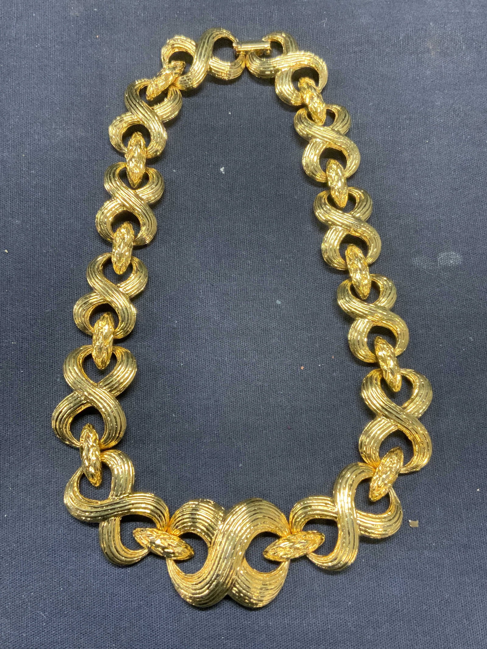 Vintage Gold Tone Chain Choker Necklace: Vintage gold tone choker necklace with figure 8 chain. Drop length approx. 5.5 inches. Some scratching observed. Estate jewelry, costume jewelry, cocktail jewelry, fashion jewelry, accessories, fashio