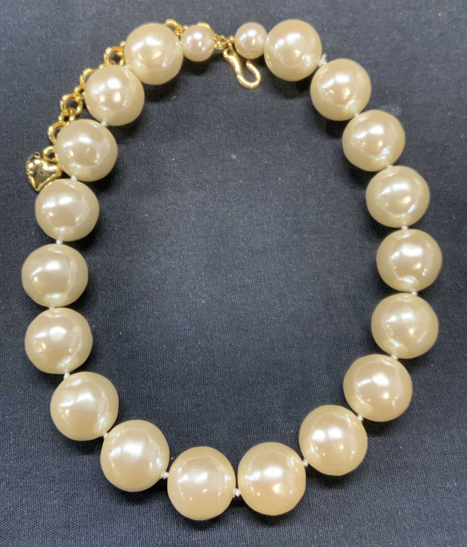 Vintage Carolee Chunky Faux Pearl Necklace: Vintage Carolee chunky faux pearl beaded necklace. Signed on hang tag. Drop length approx. 9.25 inches. Beads measure approx. .75 inches diameter. Some scratching observed. Estate jewelry, costume jew