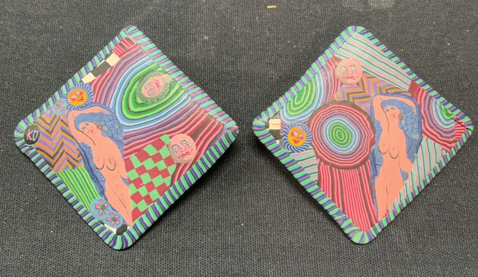 Sgnd Handmade Clay Abstract Woman Earrings: Handmade clay earrings with abstract geometric pattern, nude woman, and figural motif. Post backing. Signed KD. Measure approx. 2.5 x 2.5 inches. Some surface wear including scratching observed. Estat