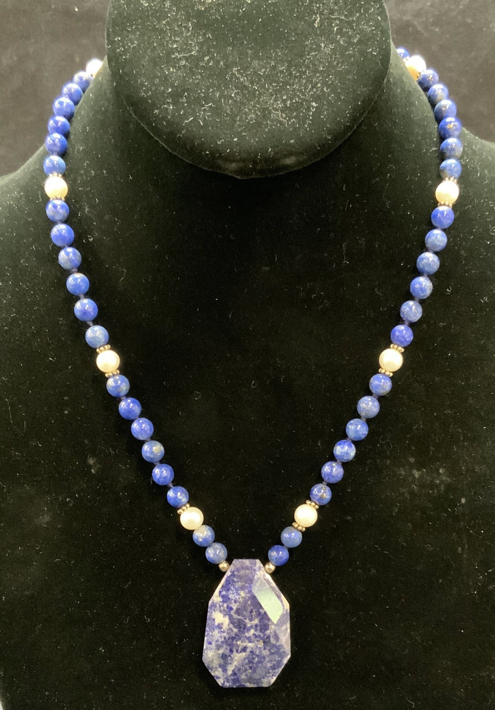 Lapis, Pearl & Sterling Silver Beaded Necklace: Lapis gemstone, pearl, and sterling silver beaded pendant necklace. Marked 925 on clasp. Drop length approx. 8.5 inches. Pendant measures approx. 1.5 x 1 inches. Total weight 34.9 grams. Some surface 