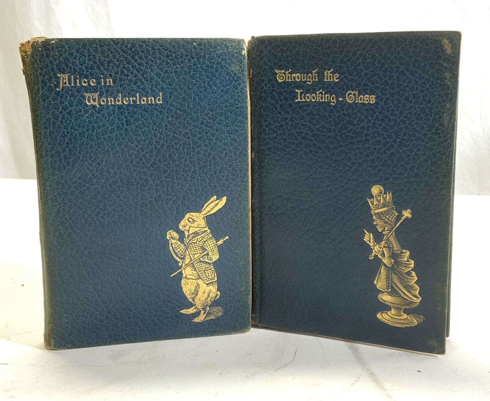 2 LEWIS CARROLL Illustr Bks, Alice Wonderland 1927: Lot 2 miniature version leather cover books by author Lewis Carroll - Alices Adventures in Wonderland and Through the Looking Glass What Alice Found There. McMillan & Co. LONDON. c. 1927 and 1928. Pri