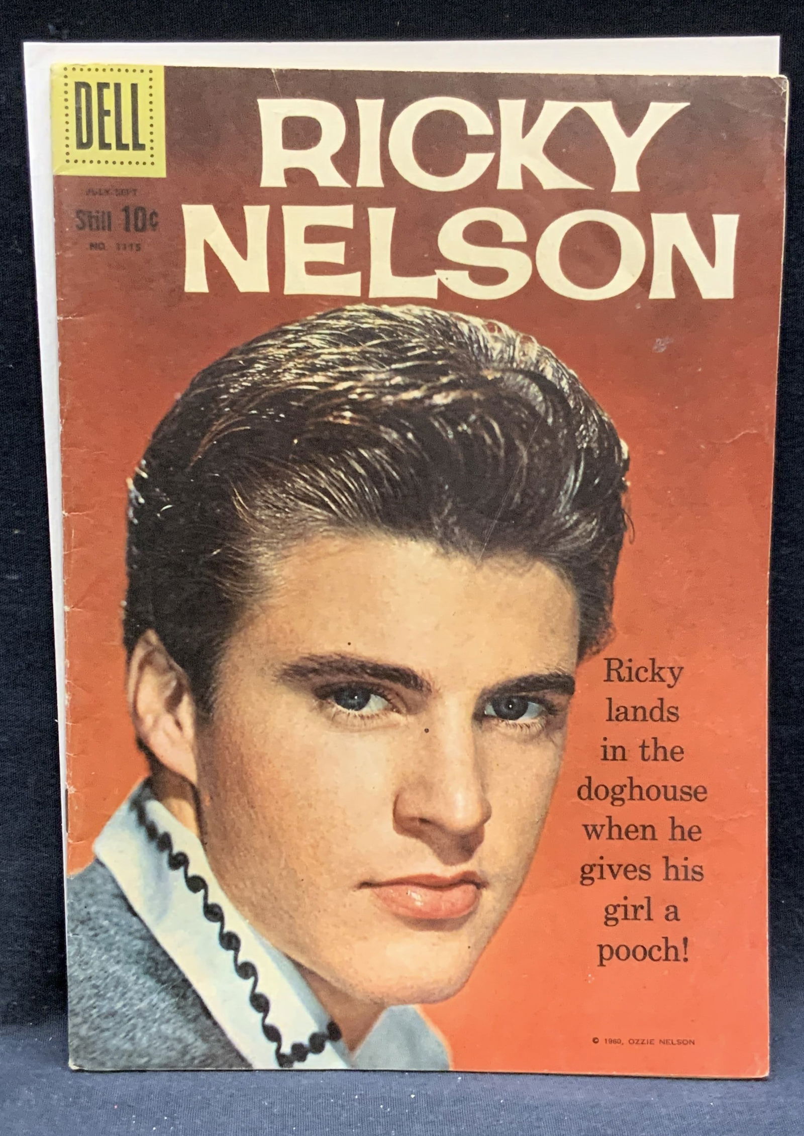 Dell Comics Ricky Nelson #1115, 1960: Dell Comics Rickey Nelson bisque number 1115. Published by Dell Publishing, 1960. Illustrated in color. Measures approx. 10.25 x 7.25 inches. Wear to cover, pages, and binding consistent with exposure
