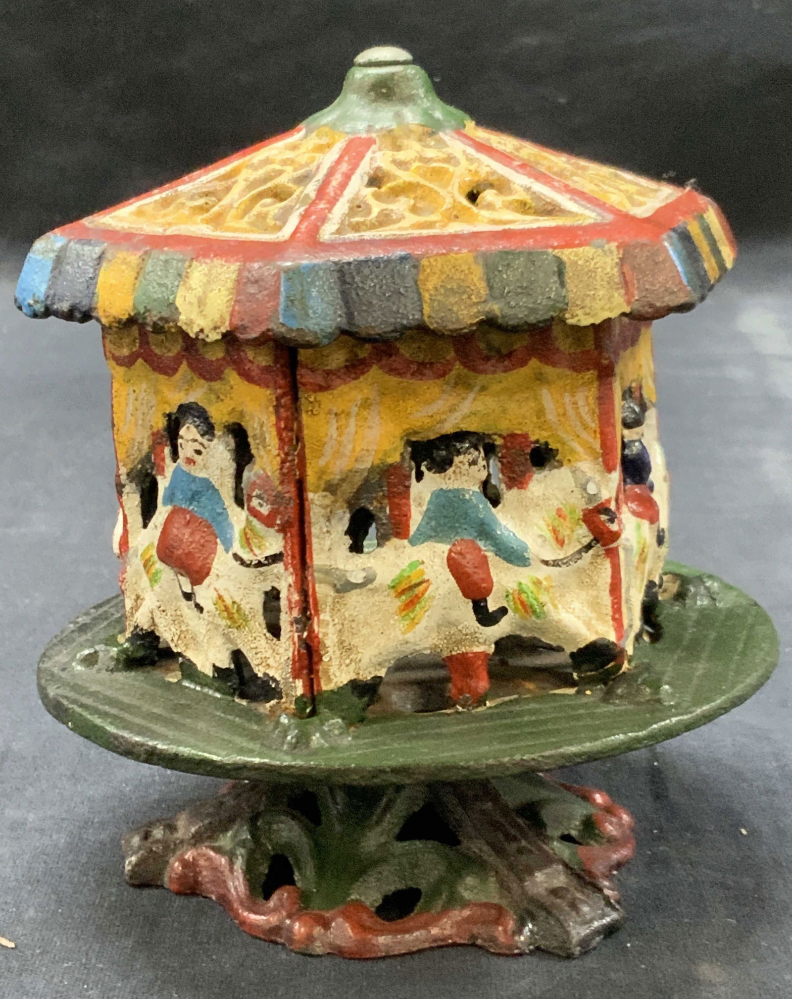 Vtg Painted Cast Iron Merry Go Round Coin Bank (1 of 8)