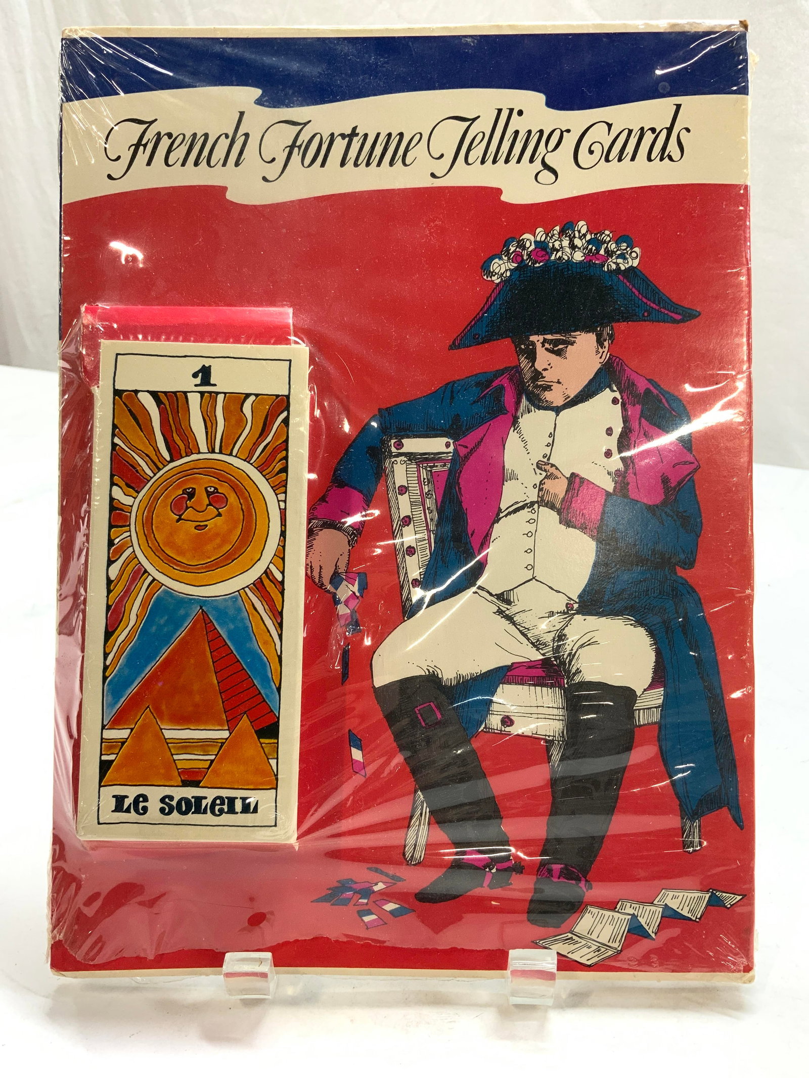 French Fortune Telling Cards & Book, NIP: Le Soleil French Fortune telling cards ( 5 x 2.25 in.) with book explains cards, card reading layouts and general directions. Book measures 11 x 8. Sealed in original packaging. French tarot card deck