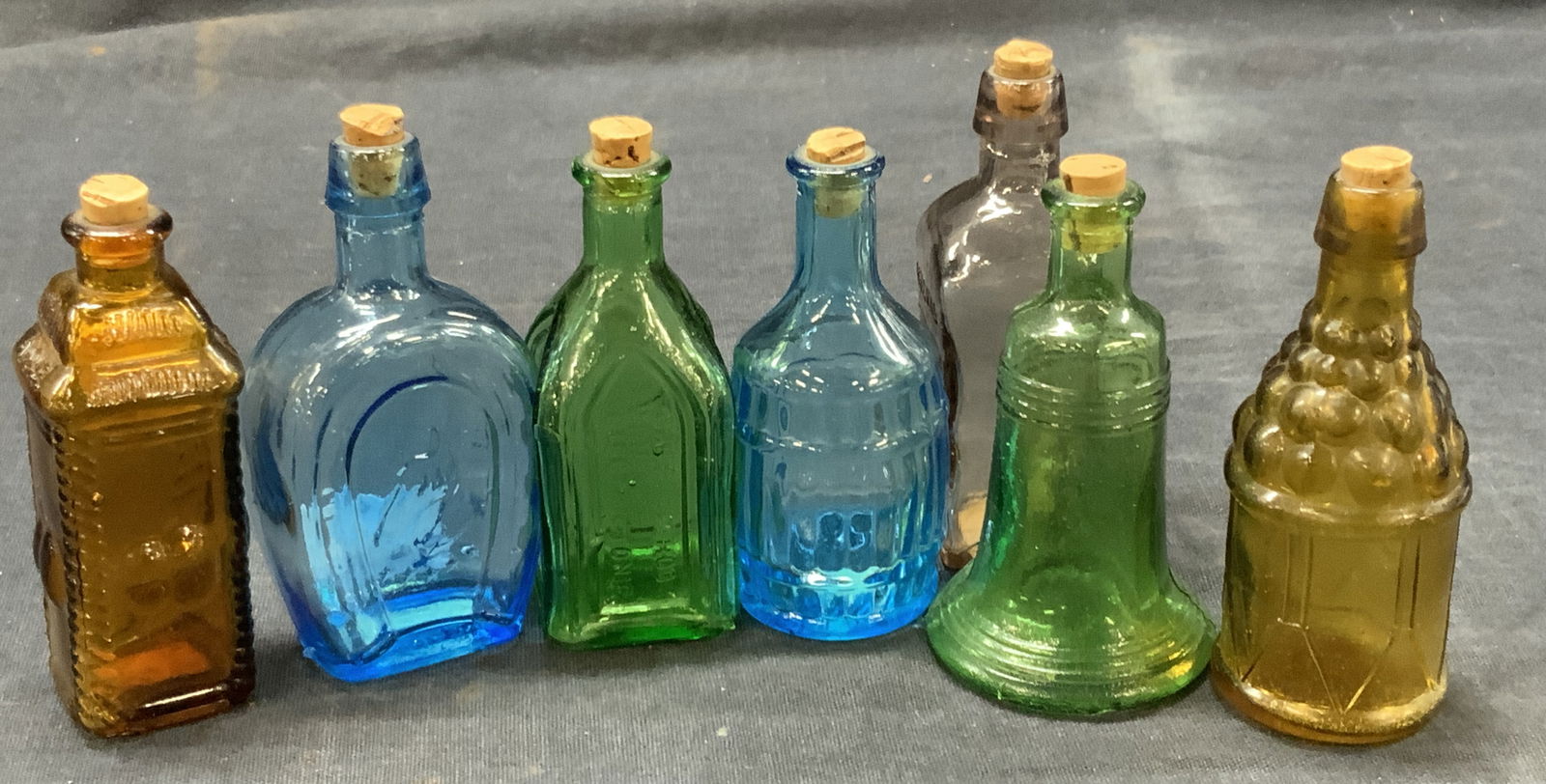Lot 7 Vtg Colored Glass Shaped Bottles (1 of 8)