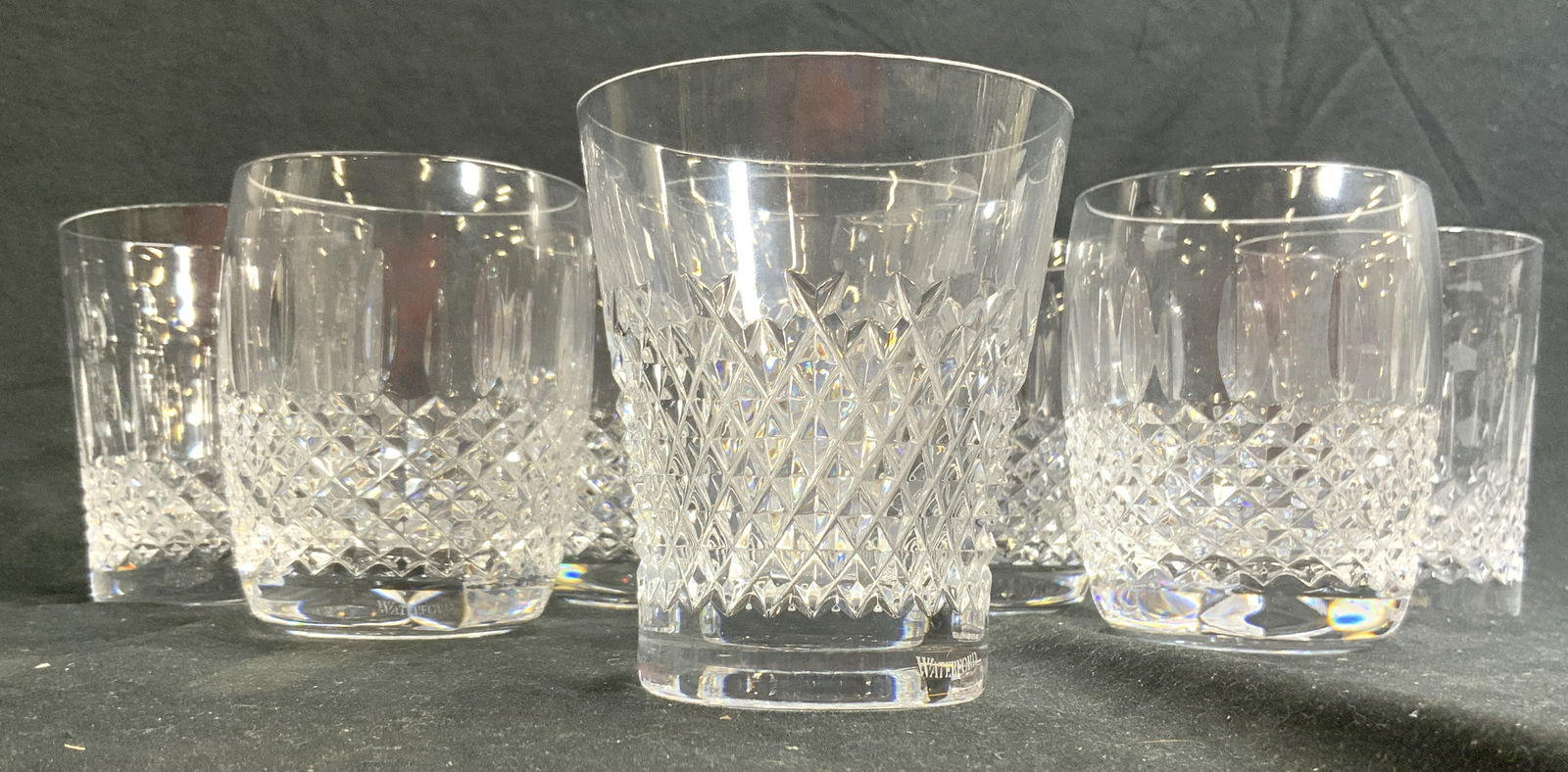 WATERFORD 8 Double Old Fashioned Crystal Glasses: Each vessel is marked for WATERFORD. All glasses are crystal. Each have diamond pattern relief detail to lower halves. Lot includes 2 pairs, and 1 set of 4. Largest glasses measure approximately 4.25