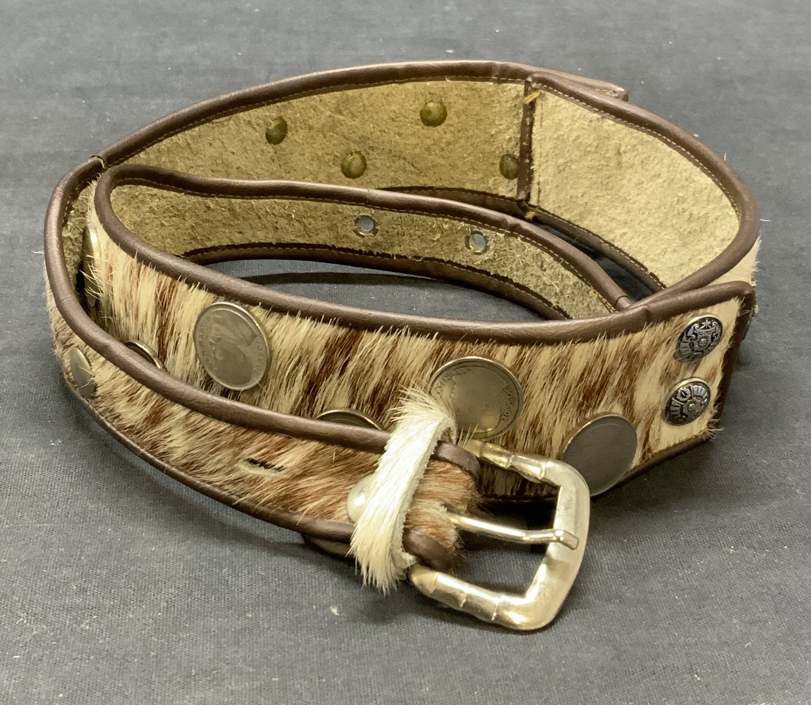 Vintage Leather & Fur Coin Belt: Vintage leather and fur belt with coin decoration. Measures approx. 32 inches long. Some wear to leather and shedding to fur observed. Leather belt, fur belt, coin belt, ladies belt, mens belt, ladies