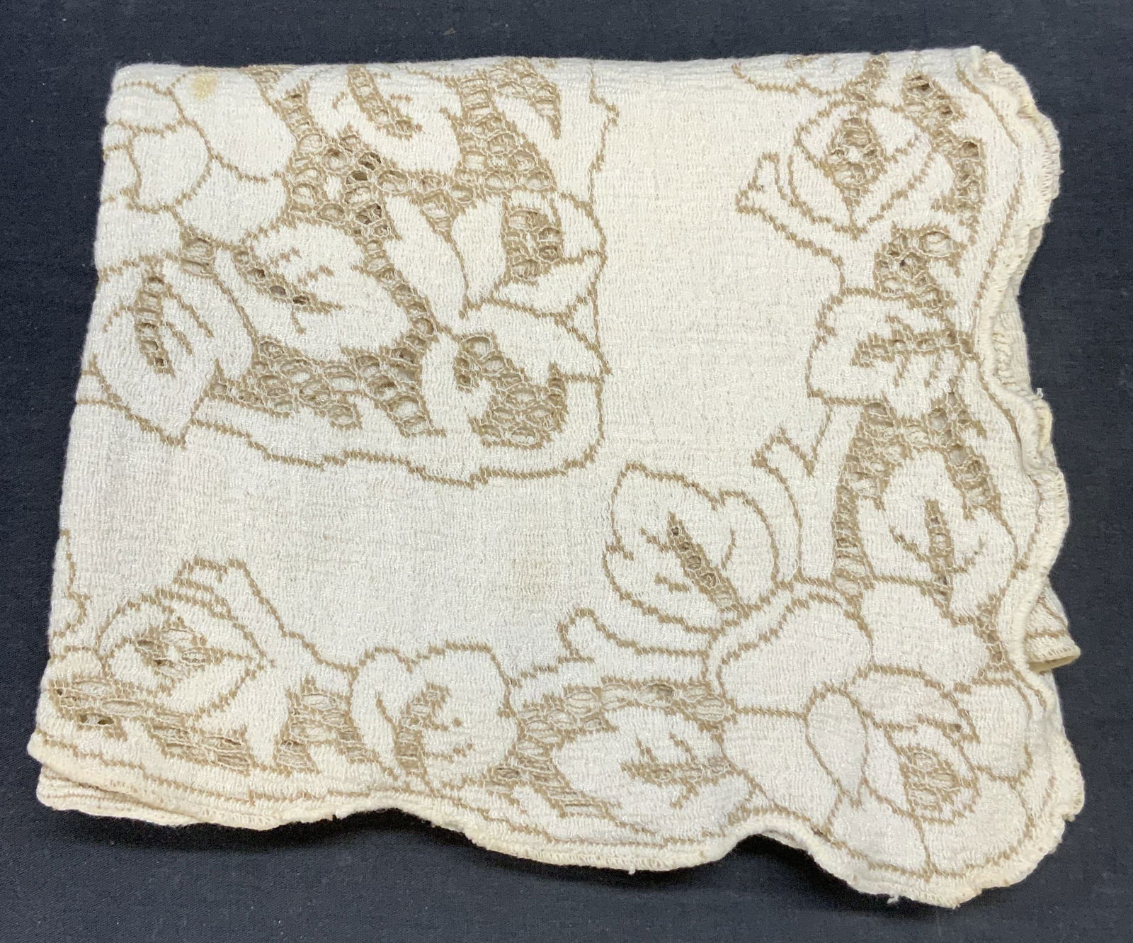 Vintage White & Tan Embroidered Tablecloth: Vintage white and tan embroidered tablecloth with floral and scroll motif. Material feels like cotton. Measures approx. 38 x 42 inches. Some wear to material and blemishes observed. Tablecloth, white