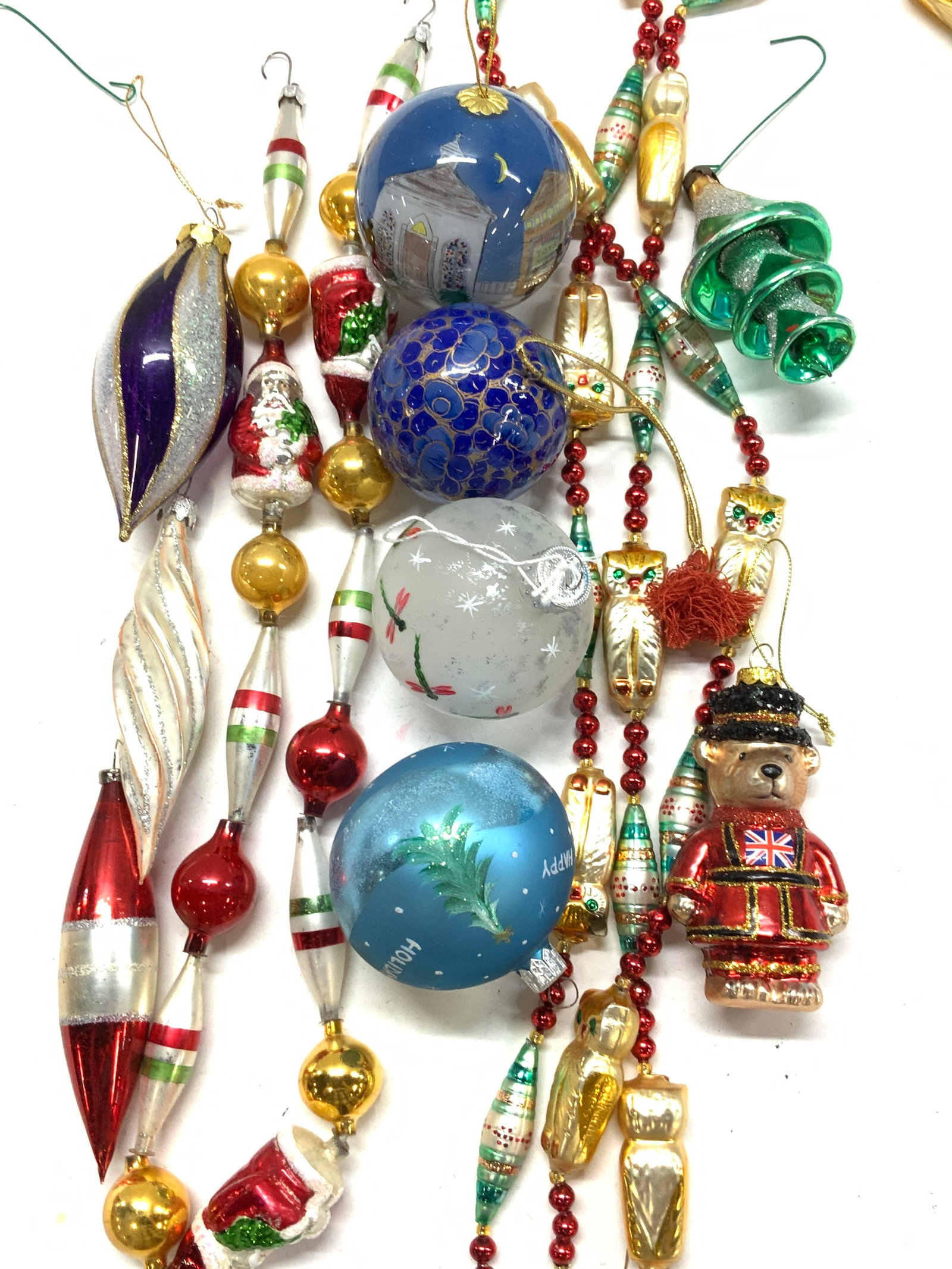 Vintage Glass Christmas Tree Ornaments/Garland 11: 11 Vintage Glass Christmas Tree ornaments and glass garland. Hand painted polar bear ornament, Paddington Bear Ornament, metallic glass ornaments and 2 metallic glass garland strands, one with owls , 