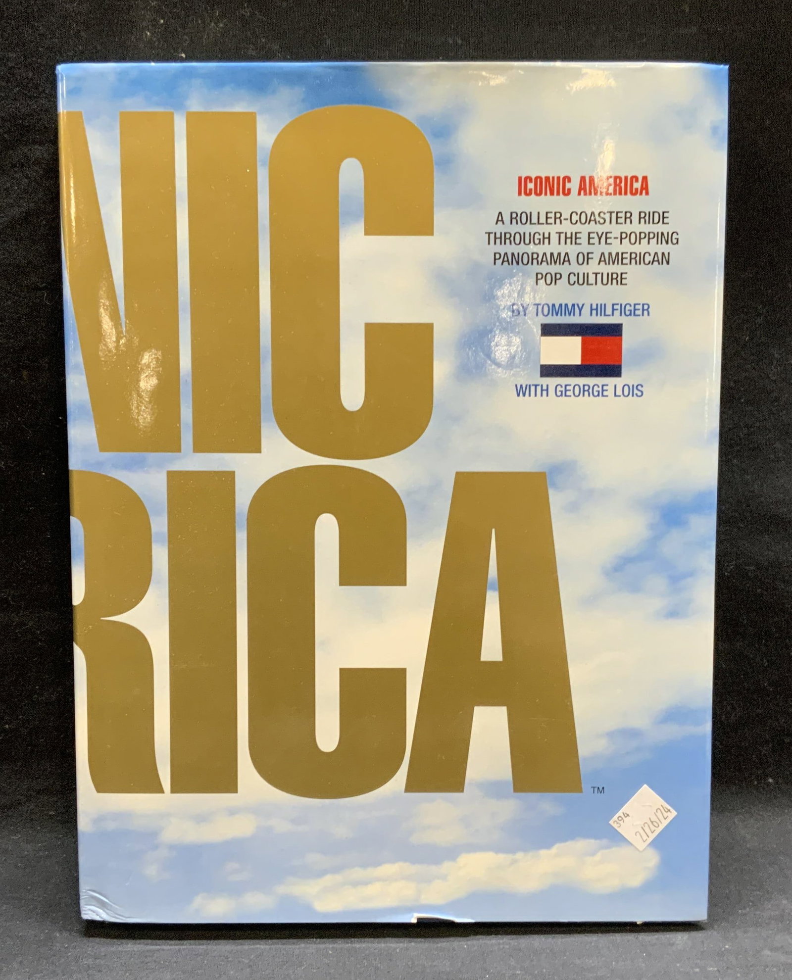 Iconic America Tommy Hilfiger, Illustrated 2007: Hardcover copy of Iconic America by Tommy Hilfiger. Published by Universe Publishing, 2007. Contains 50+ illustrations. Measures approx. 12.5 x 9.25 inches. Wear to cover, pages, and spine consistent 