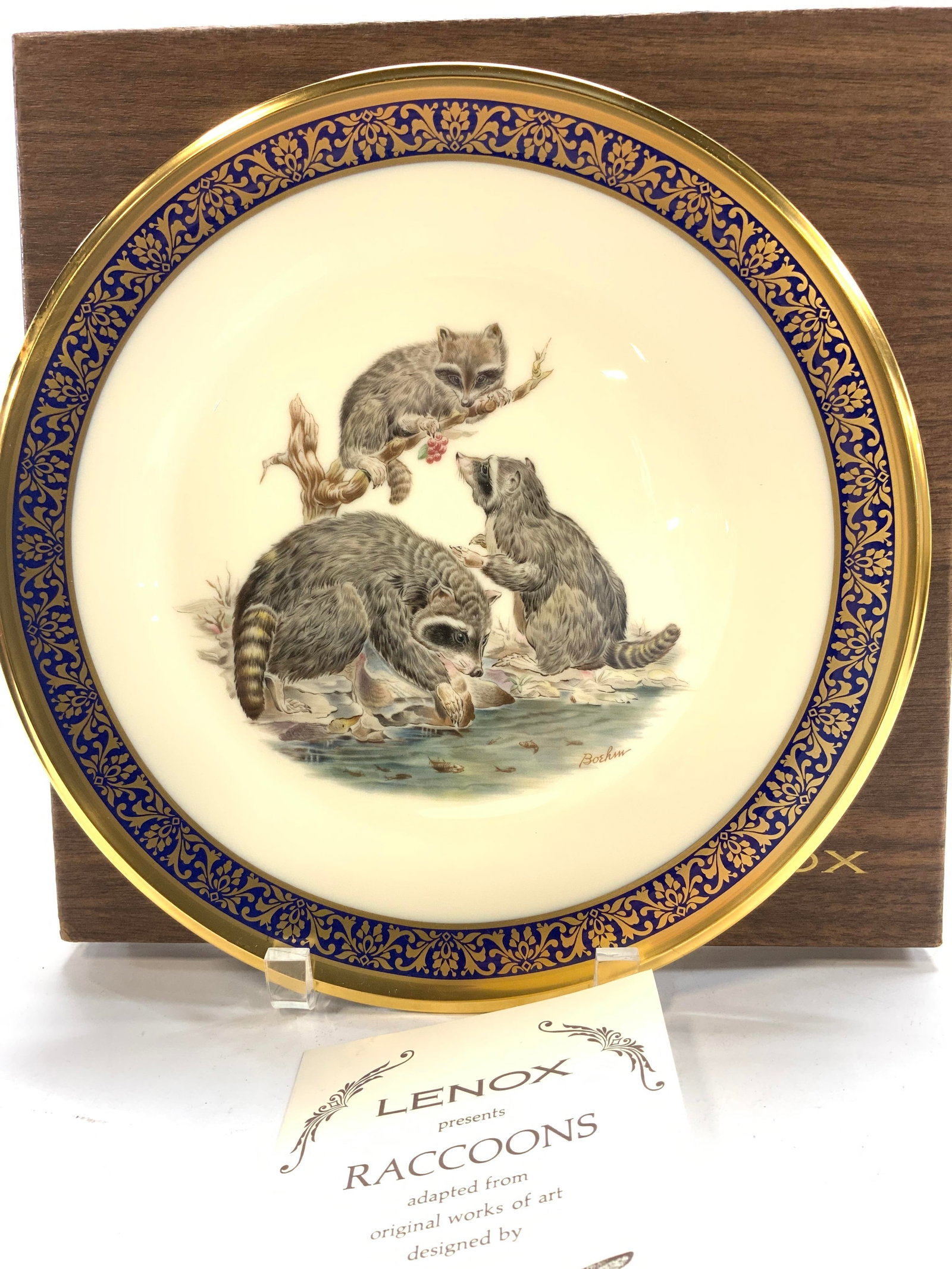 LENOX Hand Painted Racoons Porcelain Plate NIB: Designed by BOEHM is this collectible annual limited edition Decorative plate from their Woodland Woodlife series, c. 1973. Hand painted raccoons with 24 k Gilt by Lenox. In original box with card. 10