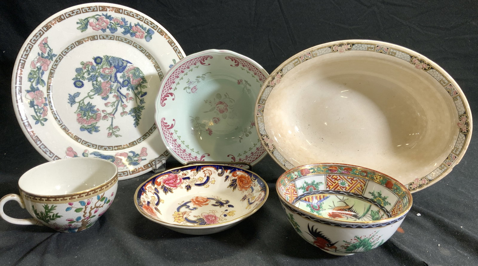 Lot 6 Porcelainware MASONS England & More: Lot includes 1 floral detailed bowl with gilt rim marked MASONS PATENT IRONSTONE MANDALAY ENGLAND, 1 Asian bowl signed on underside with Asian characters, 1 teacup, 1 oval bowl marked KT&K S V on unde