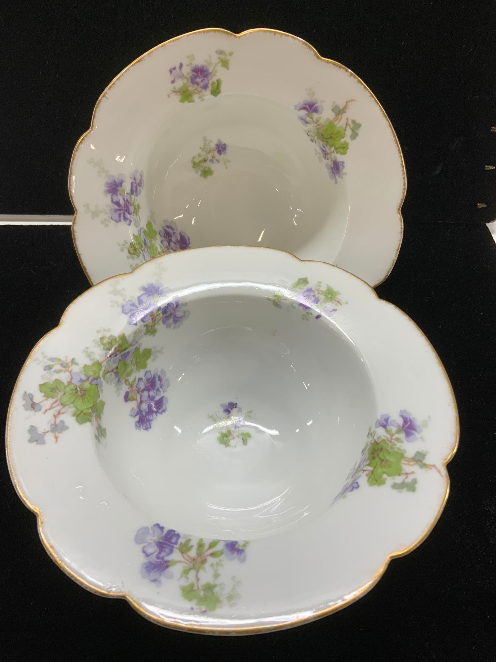 Pair Limoges France Mellen & Hewes Footed Bowls: Pair of hand painted Limoges bowl with hand painted purple flower. These have the Charles Martin & Duche Hallmark in blue ink over glaze. Also has the double flag with bird Limoges France hall marked