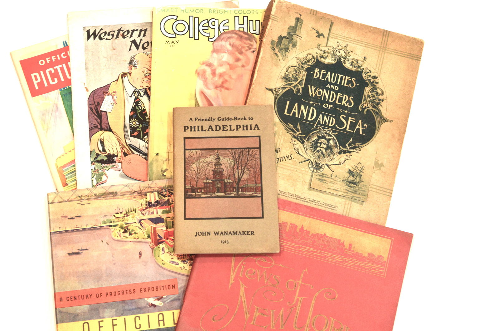 Publications from Pre and Early 20th Century 7 Pcs: Collection includes 1913 Guide to Philadelphia by John Wanamaker, a publication from Farm and Fireside from May 1895 Beauties and Wonders of Land and Sea, a black and white publication of pictures fro