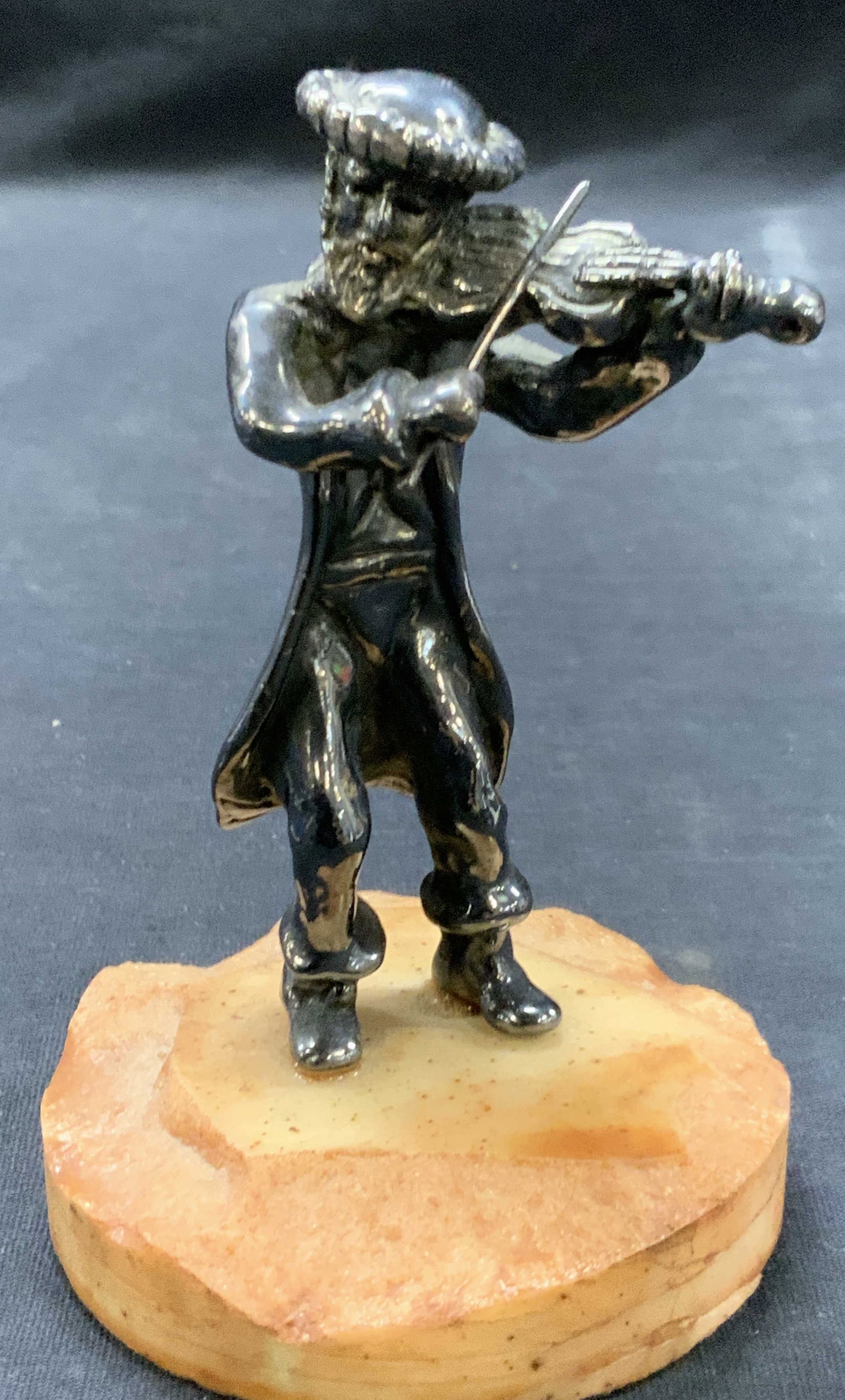 Vtg Sterling Silver Fiddling Rabbi Sculpture: Marked on figure 925. Depicts a rabbi playing a violin affixed to a marble base approx 5 inches tall and base being 3 inch diameter. Moderate wearing to figure, total weight 7.02 ozt Sterling silver f