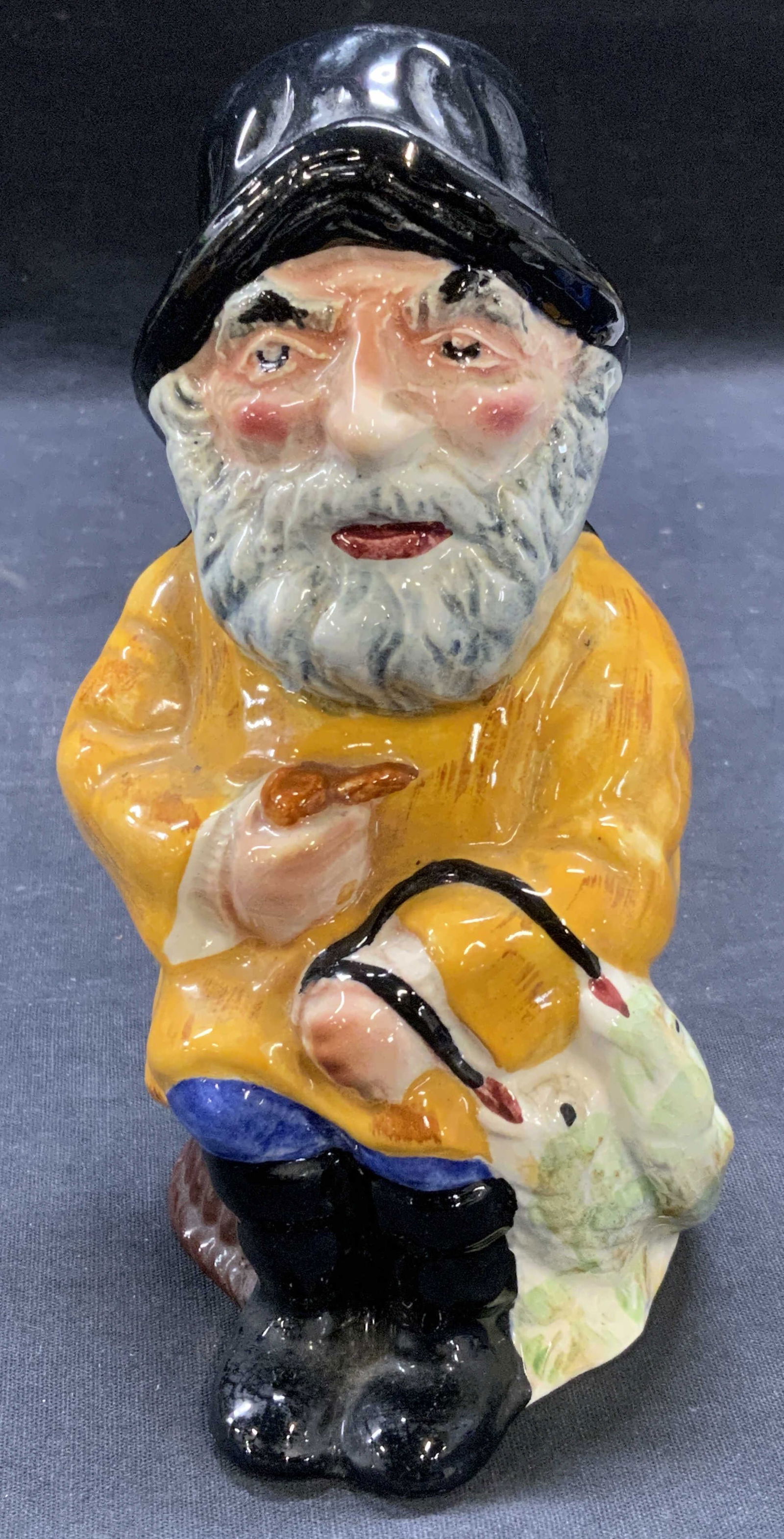 Vintage Shorter & Son Porcelain Fisherman Jug Engl: Vintage Shorter and Son Staffordshire porcelain fisherman jug. Hand painted in hues of orange and black. Trademarked to underside. Made in England. Measures approx. 5 x 3.5 x 7 inches. Some surface we