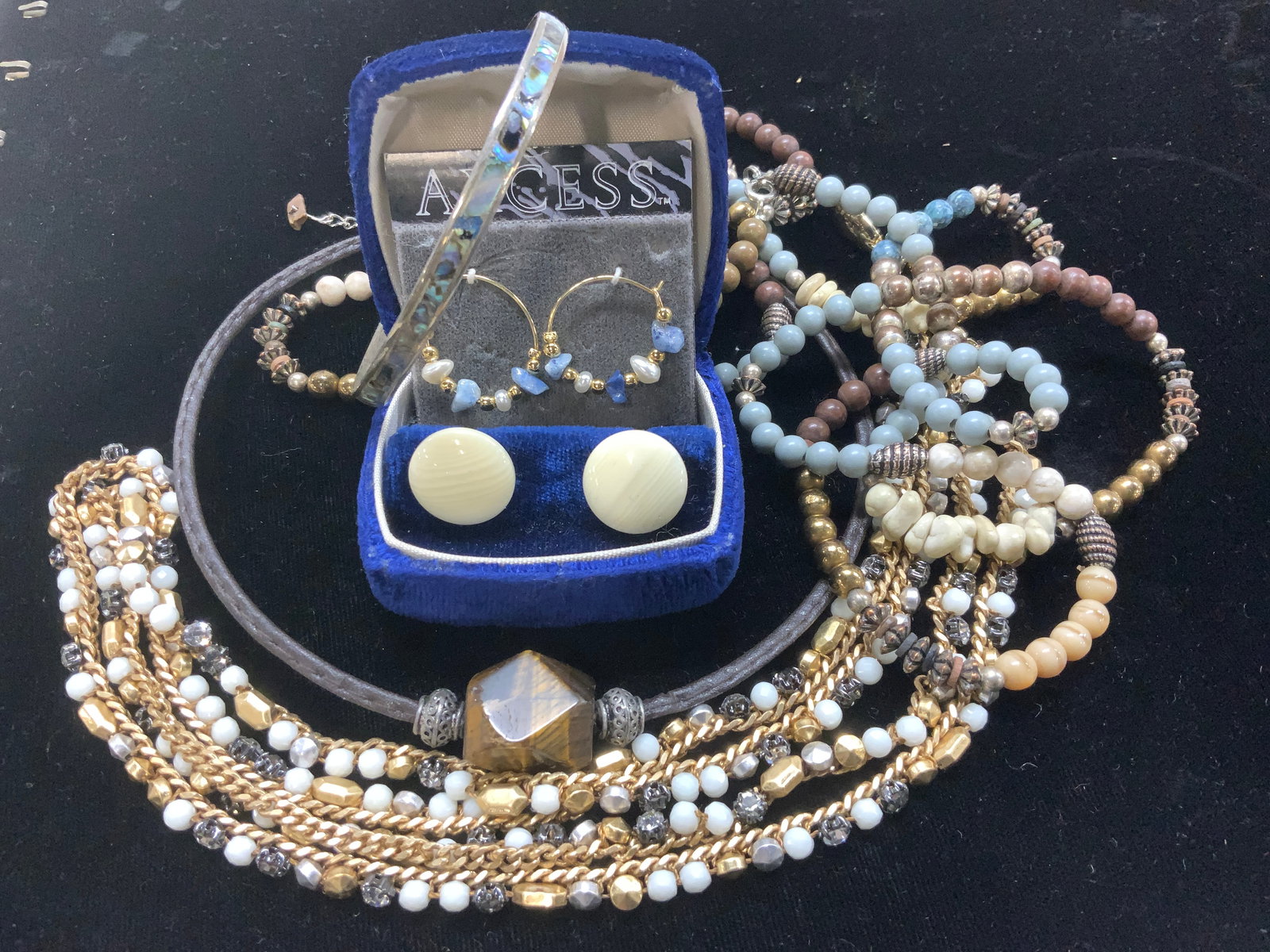 8 Jewelry: Napier, Mexican Sterling , Tigers Eye: Lot of 8 pieces of jewelry. 2 pairs of pierced earrings- Napier Button earrings and Axcess (new in package) gold tone beaded hoops, 3/4 in., Mexican sterling silver abalone bangle 3/16 in. Wide, diame