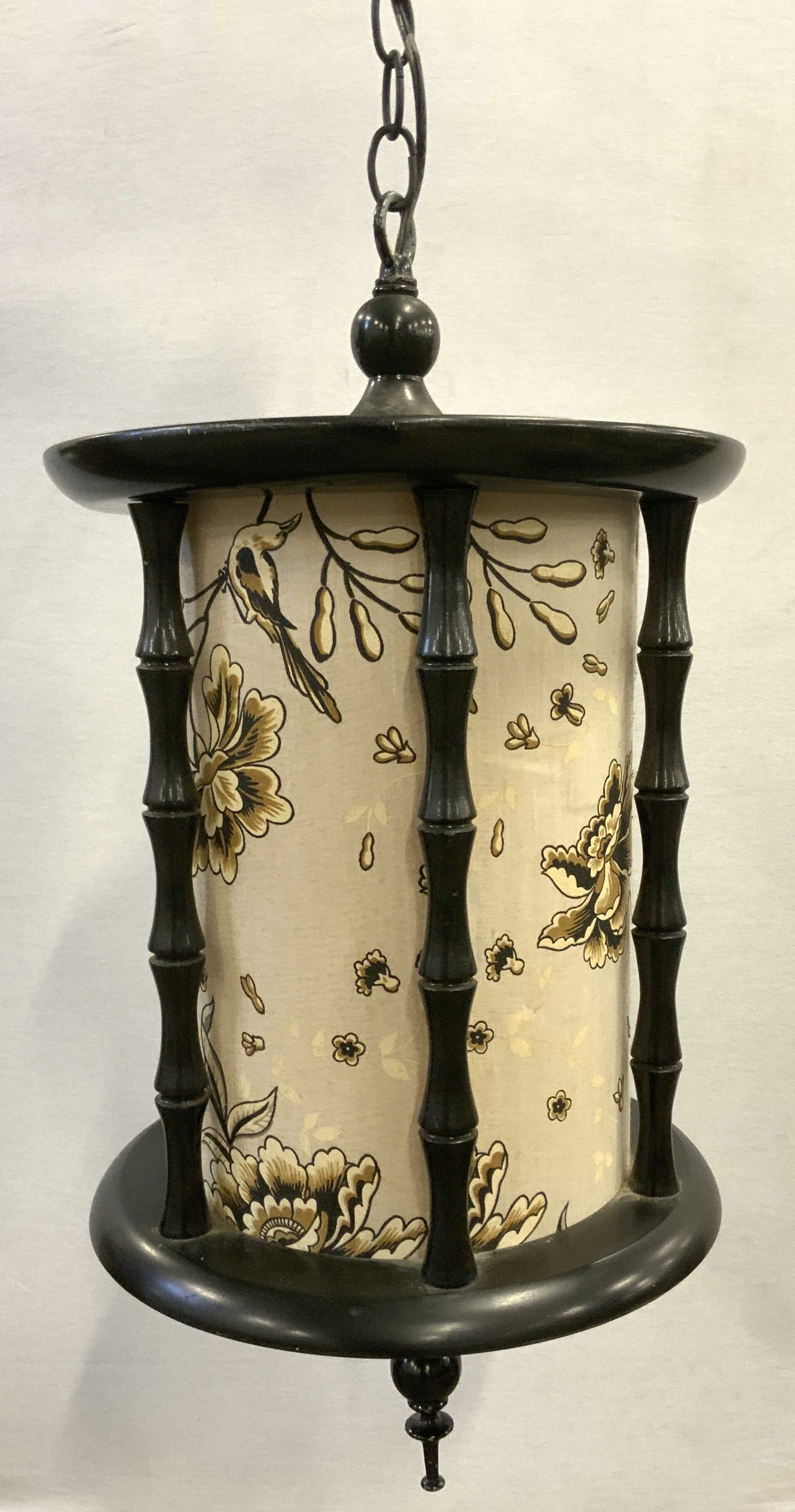 Mid Century Hand Painted Cylinder Pendant Lamp: Painted Wood cylinder hanging lamp with very long chain. Painted spindles in a glossy black and hand painted fabric shade with flower decor..Light stitch in the cord, chain and cord measure 12.5 ft. L