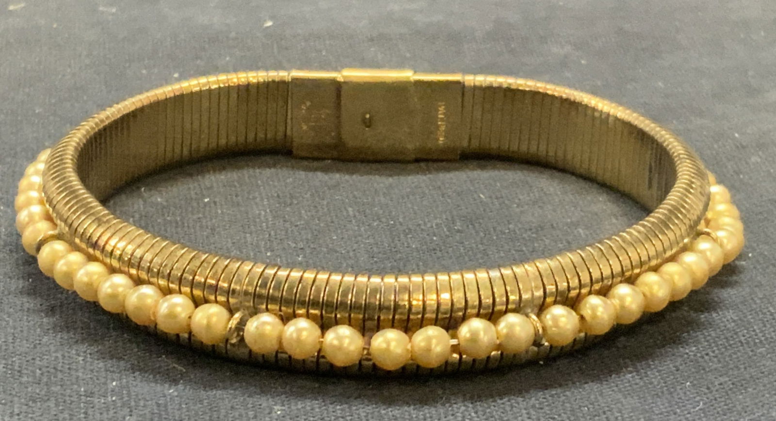Vtg B Co Gold Filled Faux Pearl Bracelet: Vintage B Co 10k gold filled bracelet with faux seed pearl beads. Signed on clasp. Measures approx. 7.5 inches long. Some surface wear including scratching observed. Estate jewelry, costume jewelry, c
