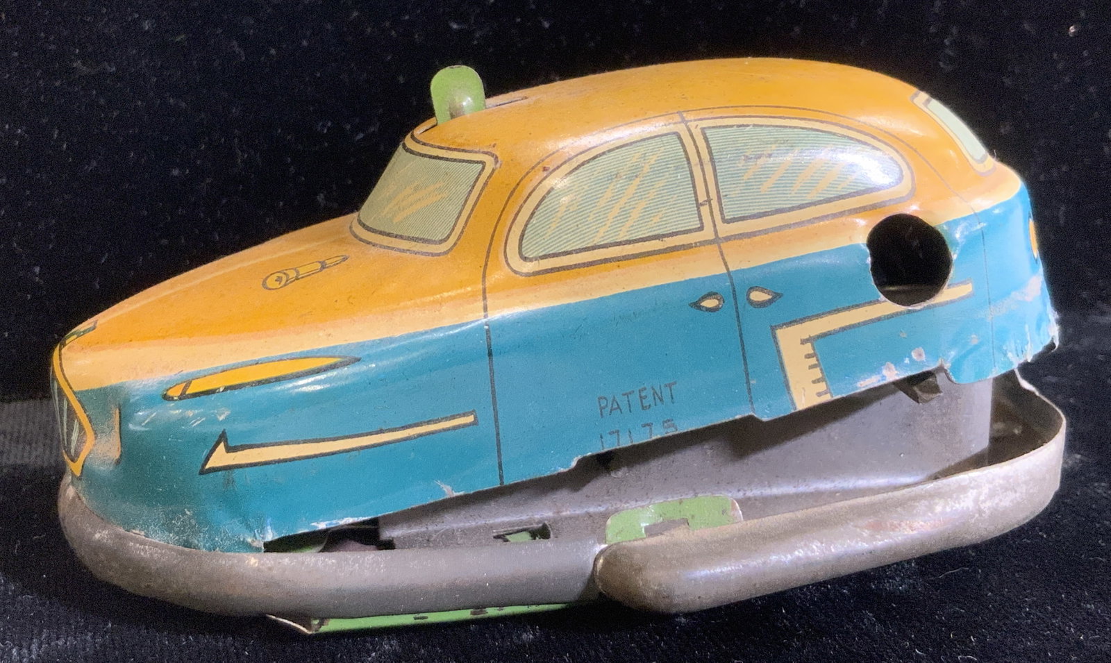 Vntg Collectible Toleware Metal Car Toy Japan: Metal toy car, made in Japan, ha s a trademark on side has wear to metal. Has a patent number 17/75. Measures 4 x 2.5 in. L x W. Has a wheel on the bottom to wheel back and release . Not operational. 