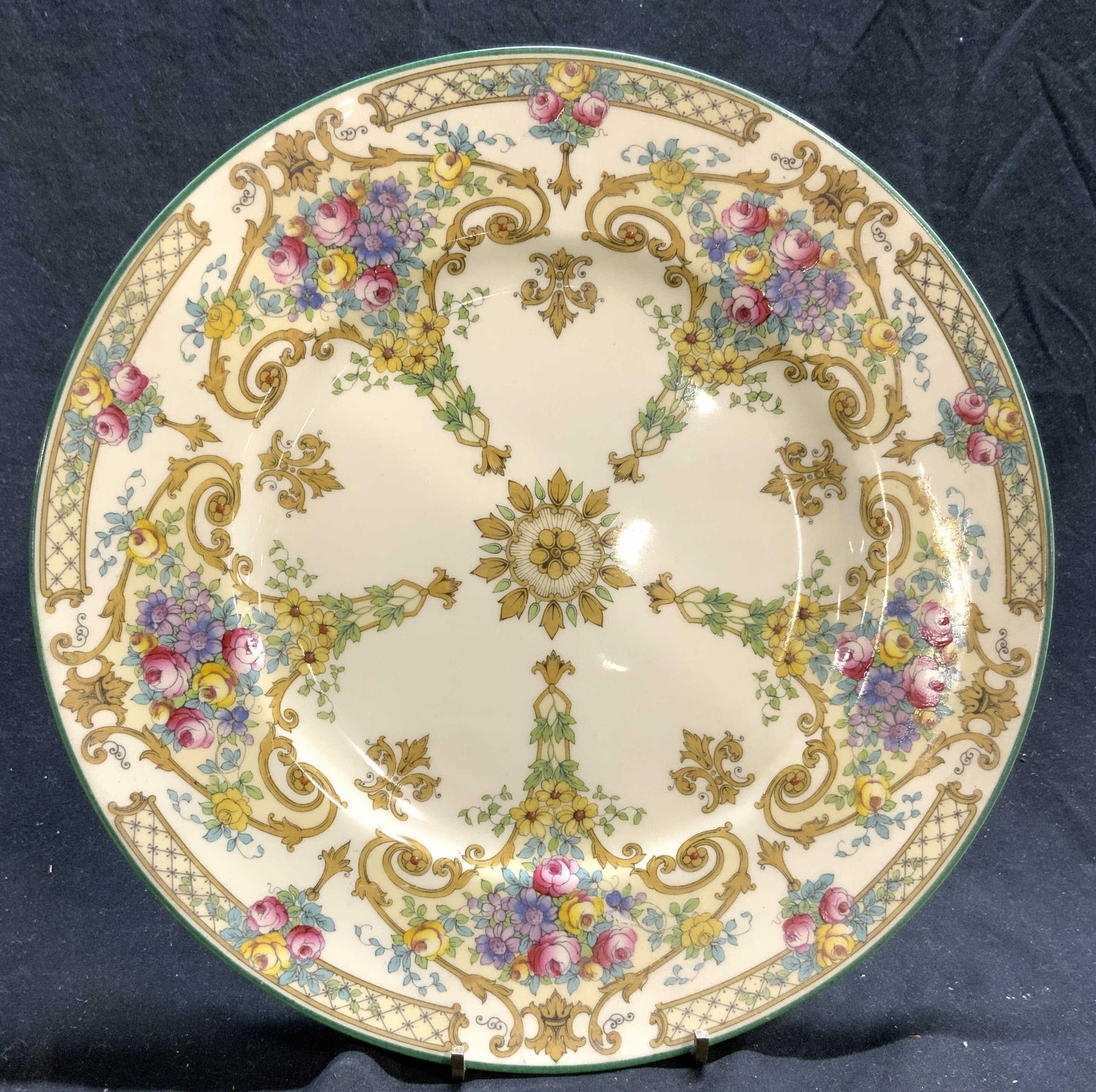 ROYAL WORCESTER Vtg Porcelain Plate ENGLAND: Underside is marked ROYAL WORCESTER MADE IN ENGLAND. Plate has intricate multi toned floral, leaf & scroll detail. Piece has circular shape. Plate measures approximately 10.5 inches diameter. English 