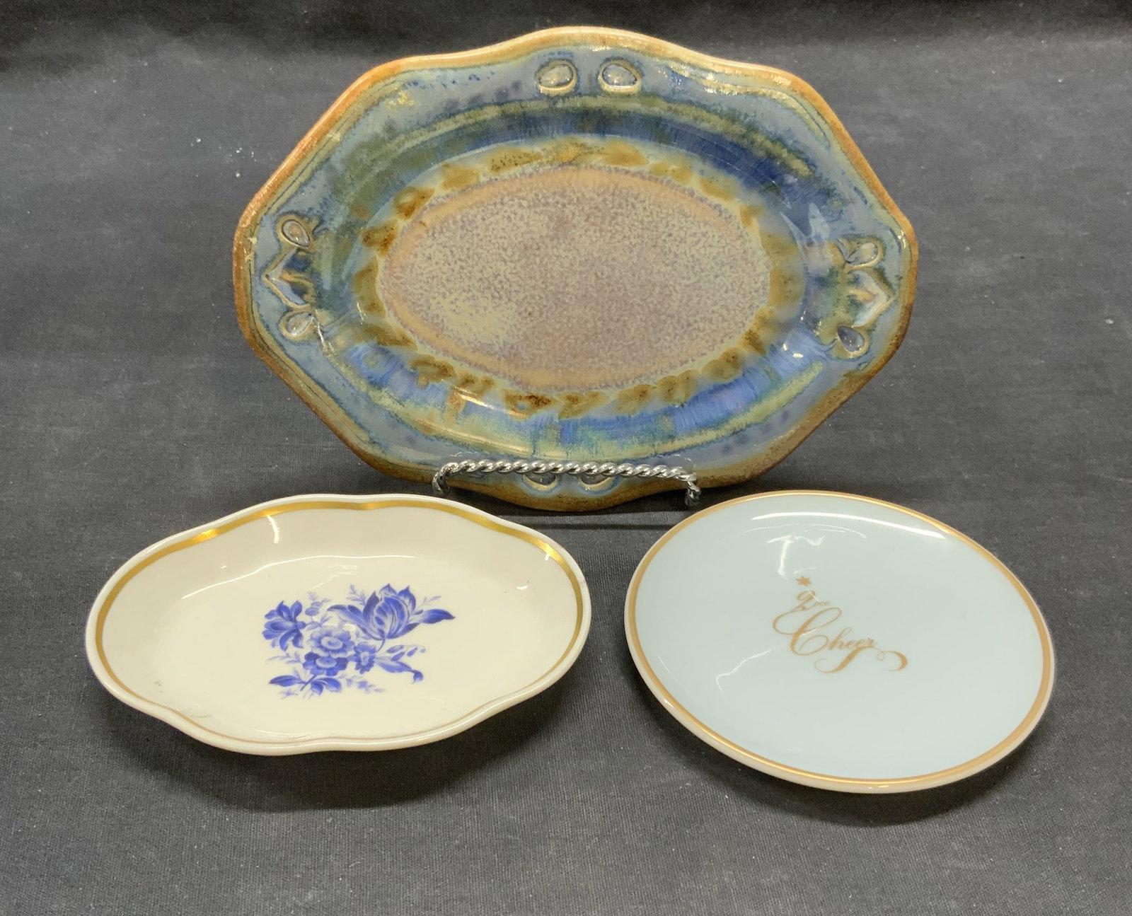Lot 3 Richard GINORI & More Porcelain Dishes: Richard GINORI gilt porcelain dish with floral motif. Trademarked to underside. Williams Sonoma gilt blue porcelain dish with Love and Cheer lettering. Trademarked to underside. Clarksville Pottery ha