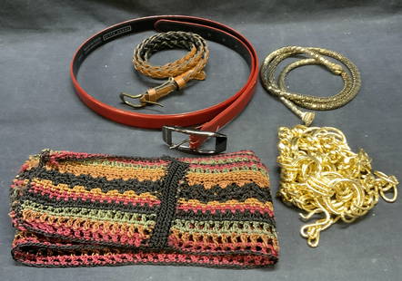 Lot 5 Chain, Woven, & Leather Belts: Lot of 5 gold tone chain, tan faux leather, red leather, and multi color woven fabric belts. Red Leather belt signed Perry Ellis, size large. Largest belt measures approx. 82 inches long. All pieces h