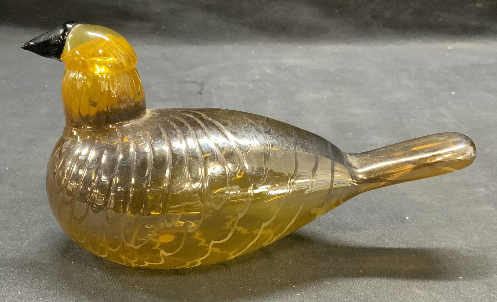 Iittala Yellow Art Glass Bird Figural, Finland: Iittala Art glass bird figural in yellow. Signed to underside. Made in Finland. Measures approx. 7.25 x 3.25 x 4 inches. Some surface wear including scratching observed. Iittala, Iittala bird, art gla