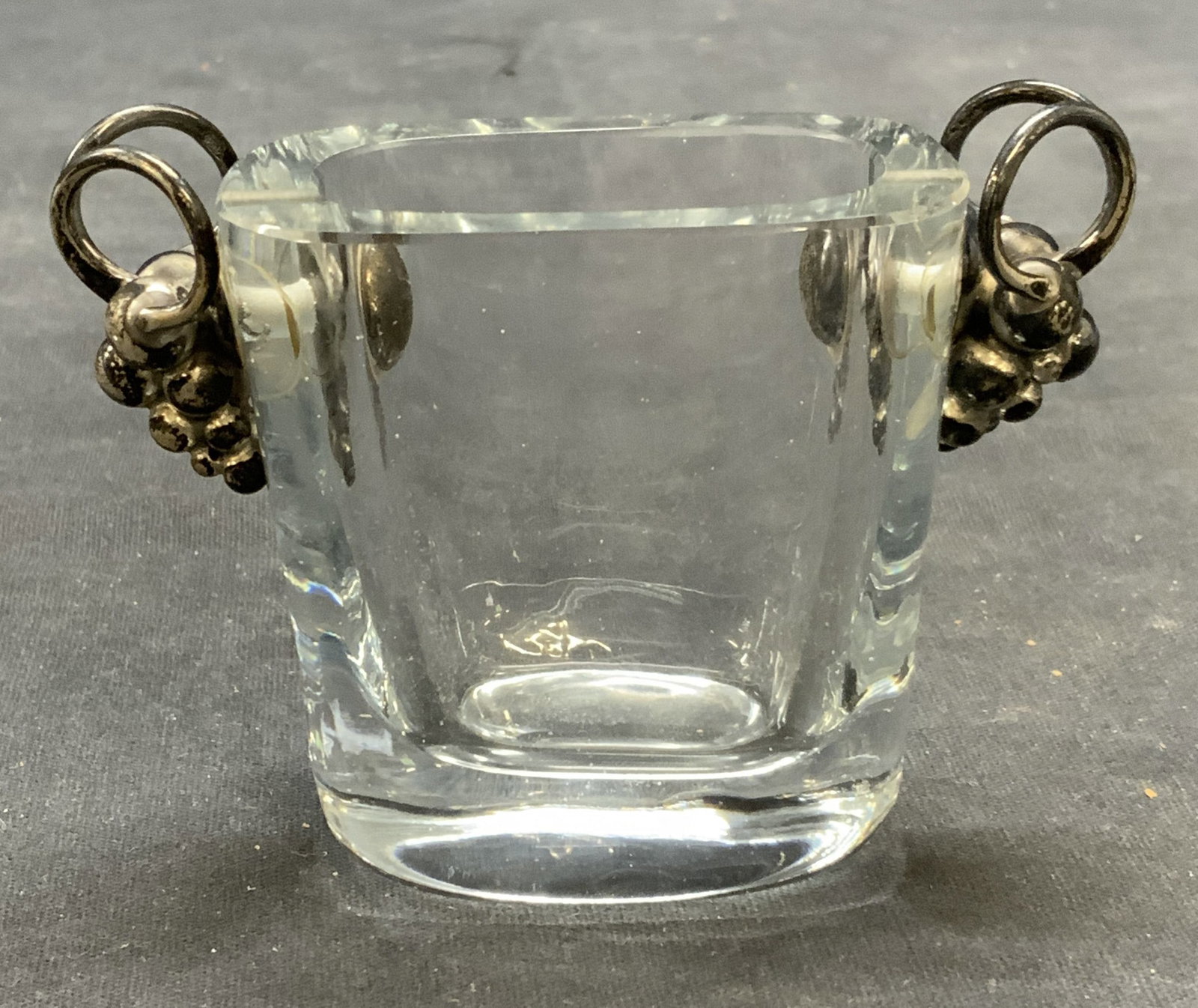 Crystal & Sterling Silver Grape Motif Vessel: Vintage crystal vessel with sterling silver grape motif detail. Measures approx. 3.5 x 1.75 x 2.5 inches. Tests for sterling using PuriTEST kit. Some surface wear including scratching and patina obser