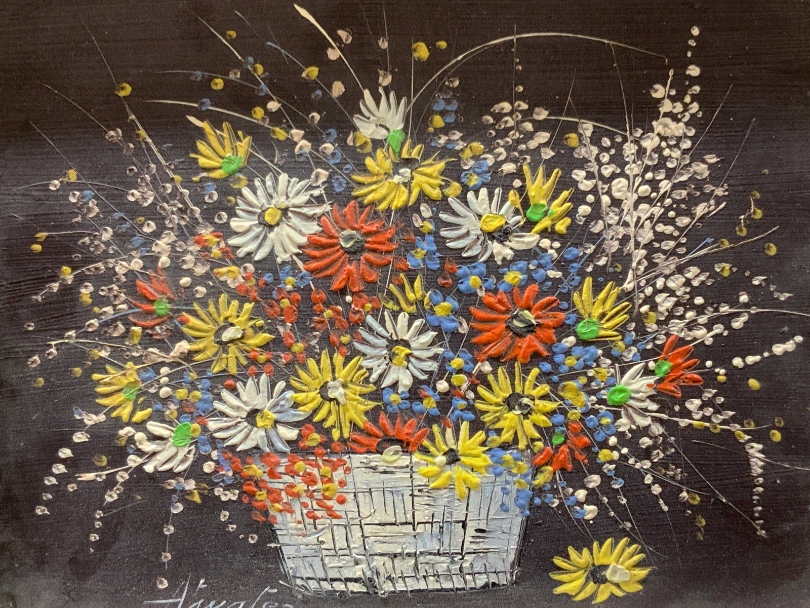 Signed Flower Bouquet Acrylic Painting: Signed on lower left corner illegible. Depicts a basket filled with blue red and yellow flowers against a black background. Framed in a white painted wooden frame. Approx 9 x 11 inches window measures
