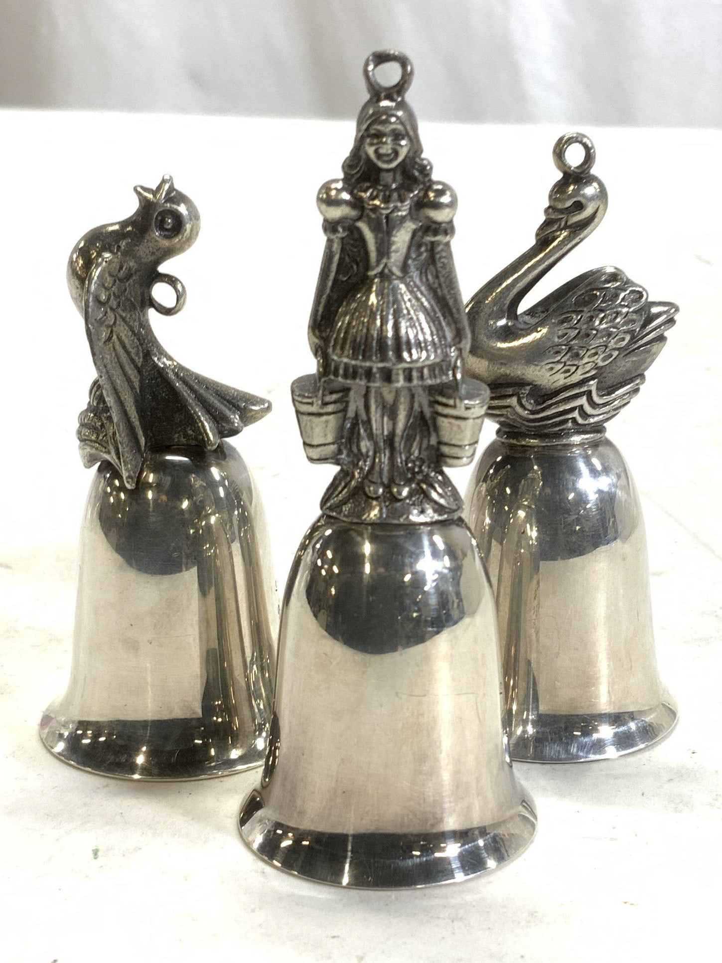 STERLING Silver R & B Christmas Music Bells: 3.79 ozt total weight. Sterling silver 12 Days of Christmas Musical Bells . 3 out of 12 featuring a different tone to each bell to play the song. Partridge, Maid Milking and Swan finials. Taller bell 