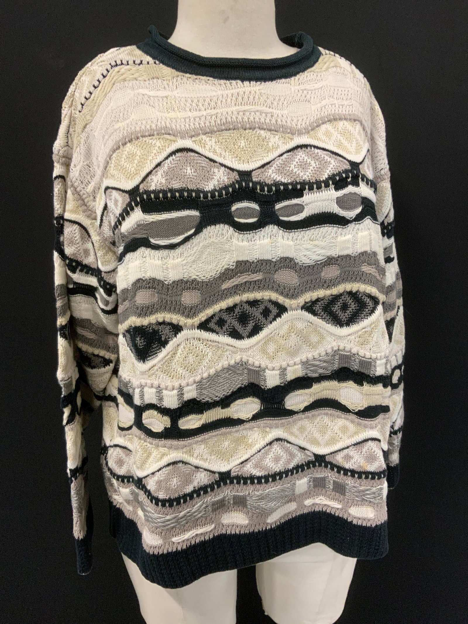 COOGI Australia Cotton Sweater, Australia: Made in Australia. Luxury Aussie company COOGI cotton sweater. Multiple geometric patterns in cream, white, black, and grey. Size M. Unisex wear. Loose threads, some spots of discoloration. Luxury Aus