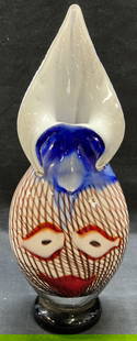 Red, White, Blue Face Art Glass Vase: Hand blown art glass vase with face with stripe motif. Hues of red, white, and blue. Thick walled glass, piece has weight. Measures approx. 6 x 3.5 x 16 inches. Some surface wear including