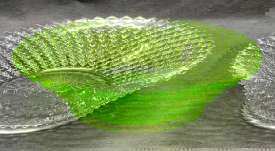 Vintage Uranium Glass Style Diamond Bowl: Vintage uranium glass style diamond pattern bowl. Raised surface. Appears to fluoresce under UV light. Measures approx. 9.25 x 2.75 inches. Thick walled glass, piece has weight. Some surface wear