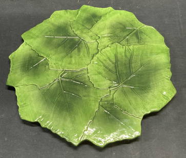VIETRI Porcelain Green Leaf Platter, Italy: VIETRI porcelain platter with raised leaf motif in green. Trademarked to underside, made in Italy. Numbered 7628/35. Measures approx. 13.5 inches wide. Some surface wear including scratching