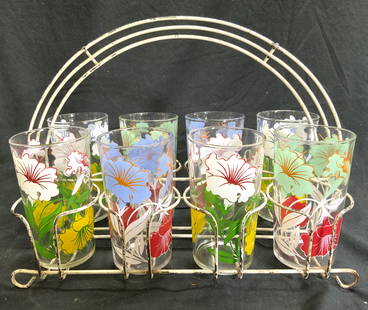 Lot 9 Morning Glory Drinking Glasses & Rack: Lot includes 8 drinking glasses. Each appear to be Morning Glory with multi toned floral and leaf detail. Lot also includes cup holder/cup rack. Piece has arch form handle. Each glass measures