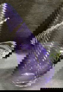 Signed Purple Art Glass Swirl Table Accessory: Hand blown signed purple and clear art glass table accessory with raised swirl detail. Signed illegibly on body. Thick walled glass, piece has weight. Measures approx. 7 inches wide and 10.5